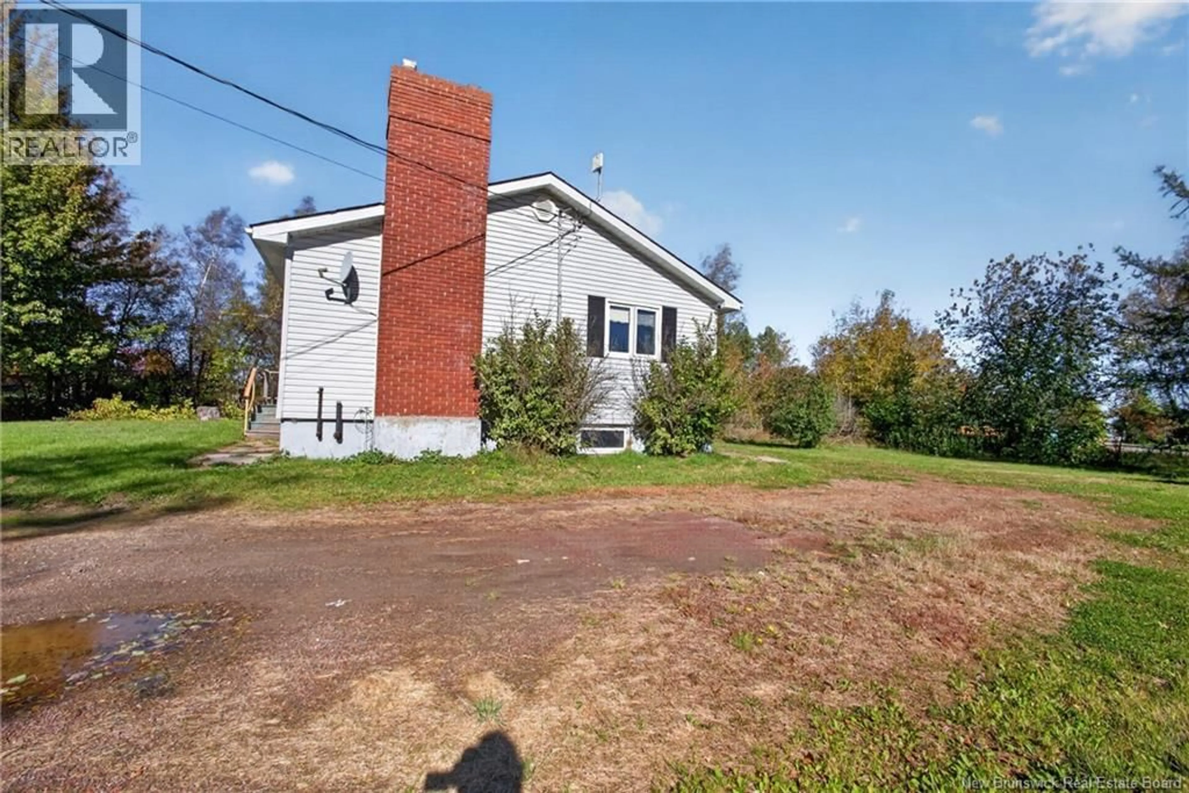 A pic from outside/outdoor area/front of a property/back of a property/a pic from drone, building for 136 ACADIE STREET, Bouctouche New Brunswick E4S2T4