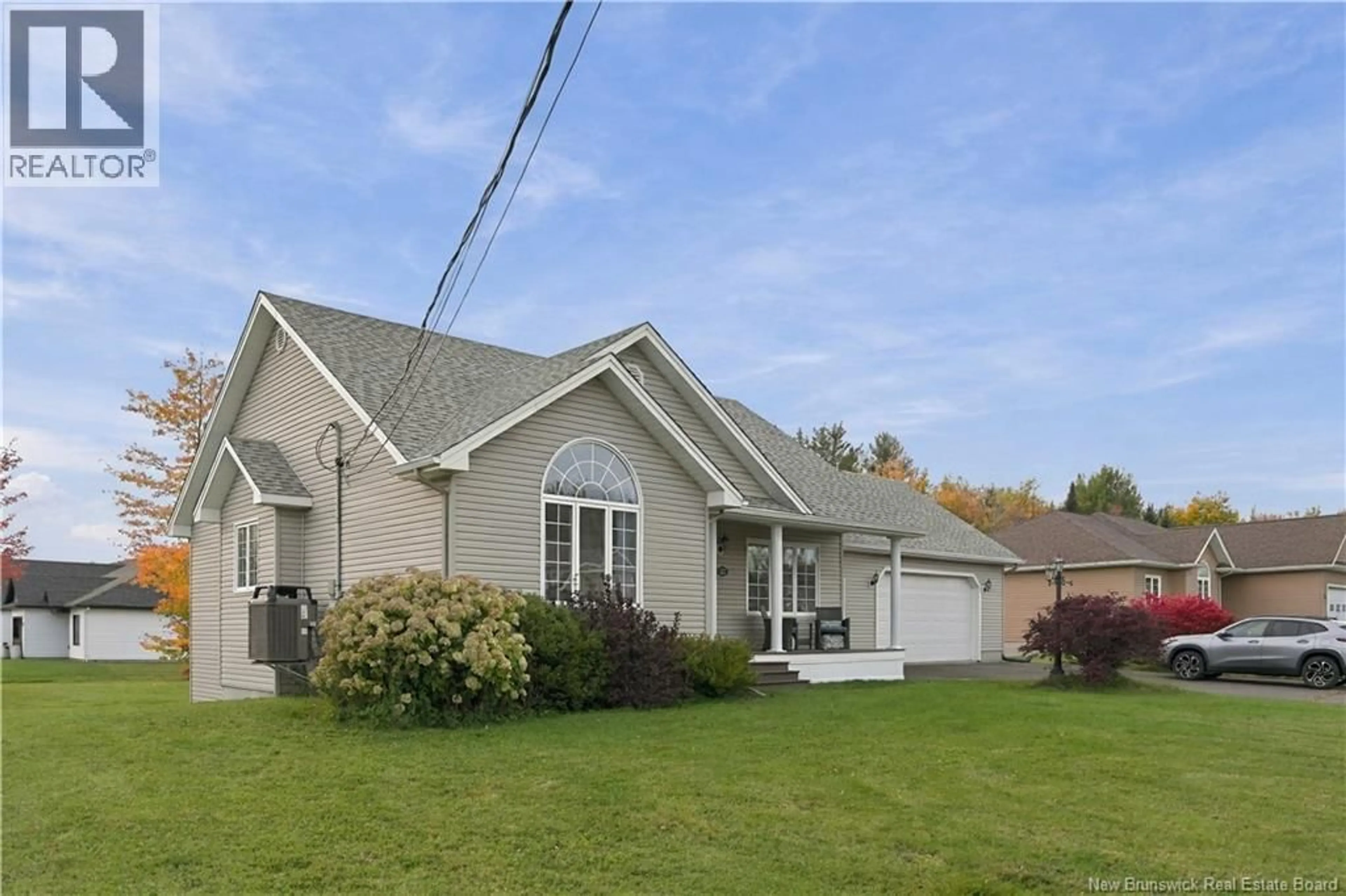 Home with vinyl exterior material, street for 72 LEGER STREET, Saint-Antoine New Brunswick E4V1J7