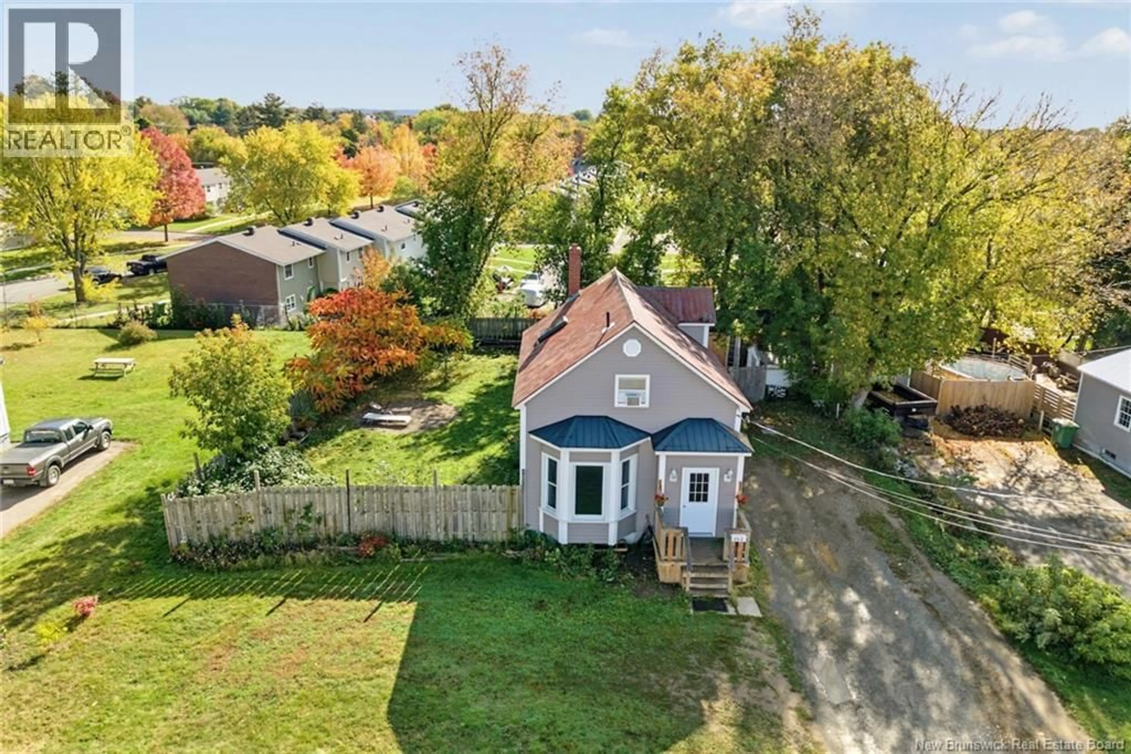 A pic from outside/outdoor area/front of a property/back of a property/a pic from drone, street for 272 HUGHES STREET, Devon New Brunswick E3A2W3