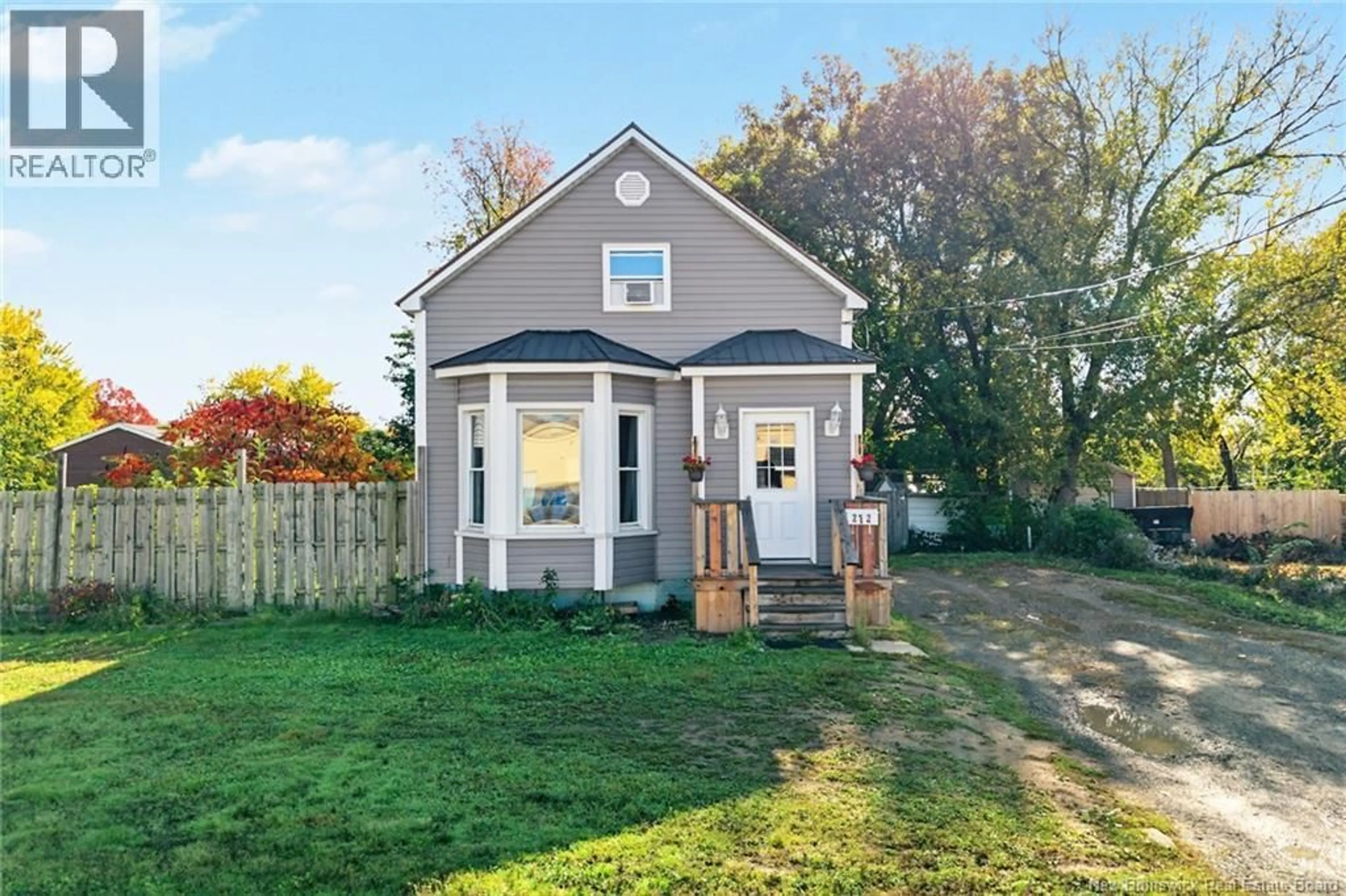 Home with vinyl exterior material, street for 272 HUGHES STREET, Devon New Brunswick E3A2W3