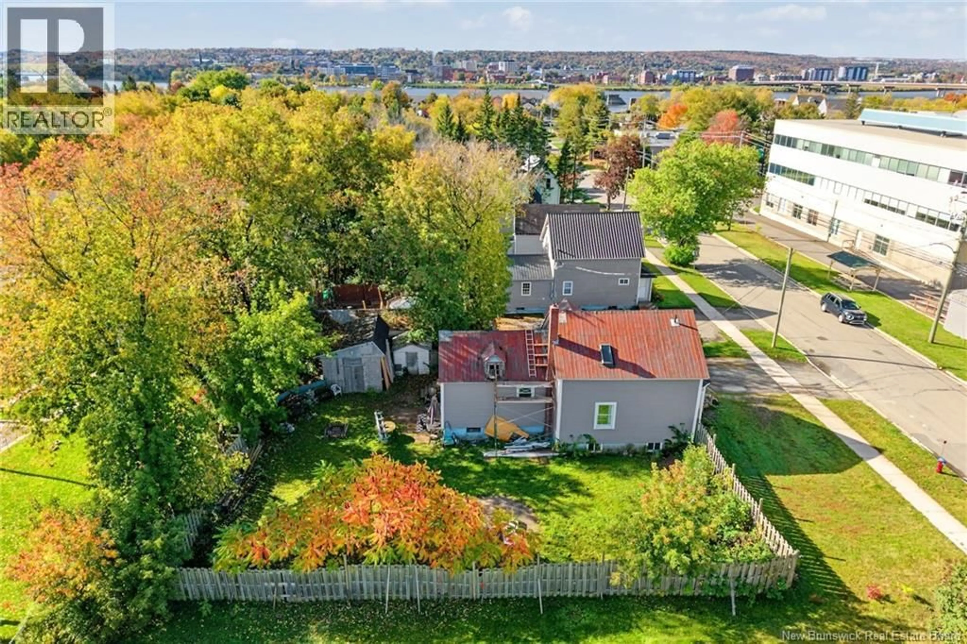 A pic from outside/outdoor area/front of a property/back of a property/a pic from drone, street for 272 HUGHES STREET, Devon New Brunswick E3A2W3