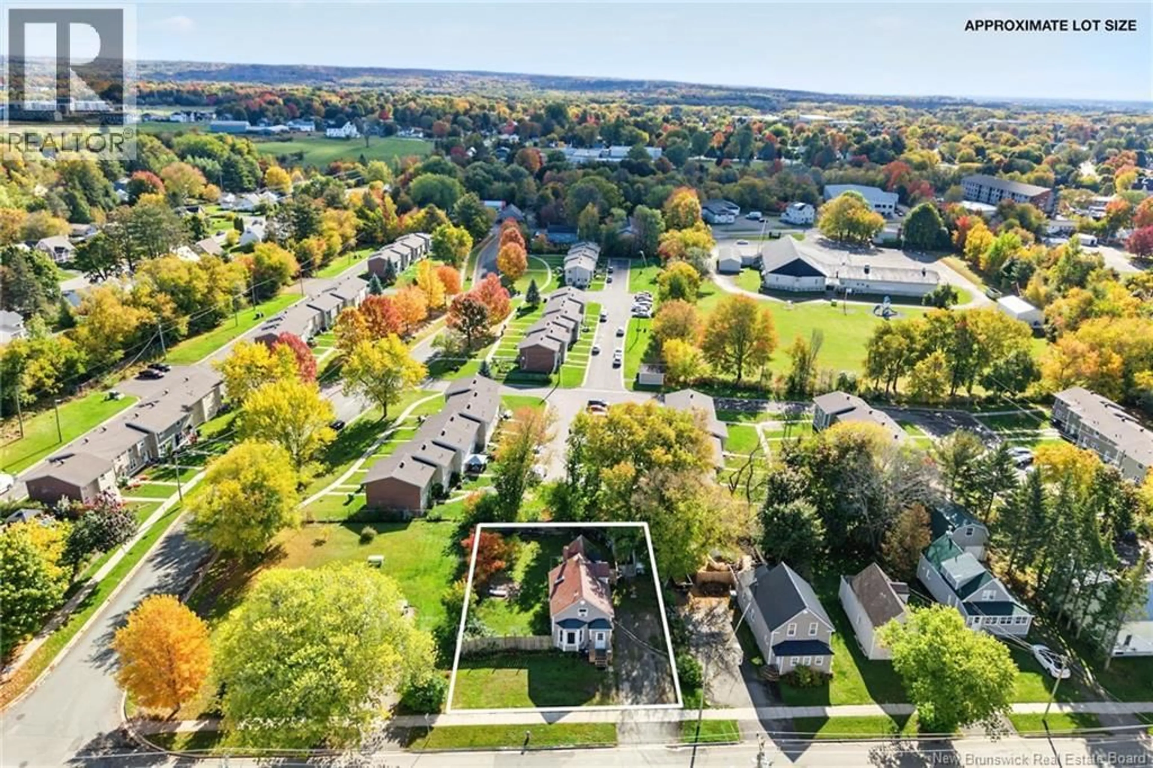 A pic from outside/outdoor area/front of a property/back of a property/a pic from drone, street for 272 HUGHES STREET, Devon New Brunswick E3A2W3