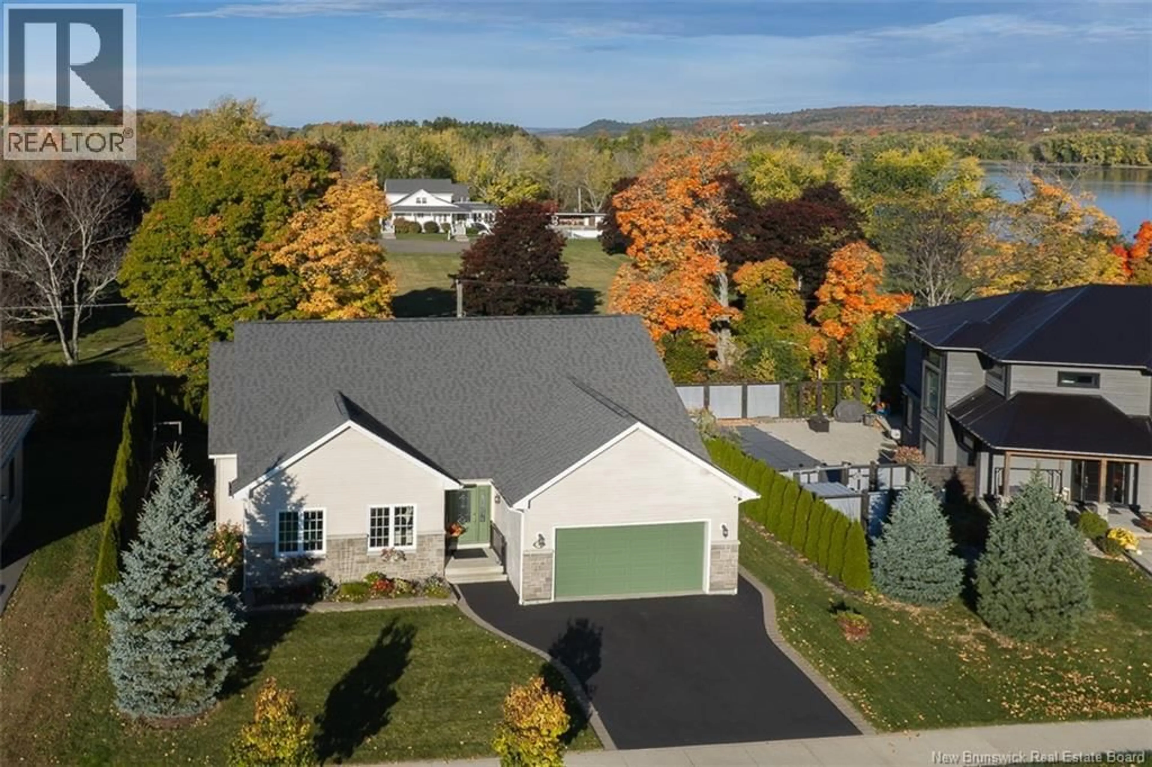 A pic from outside/outdoor area/front of a property/back of a property/a pic from drone, street for 138 STILL WATER CRESCENT, Fredericton New Brunswick E3B0V8