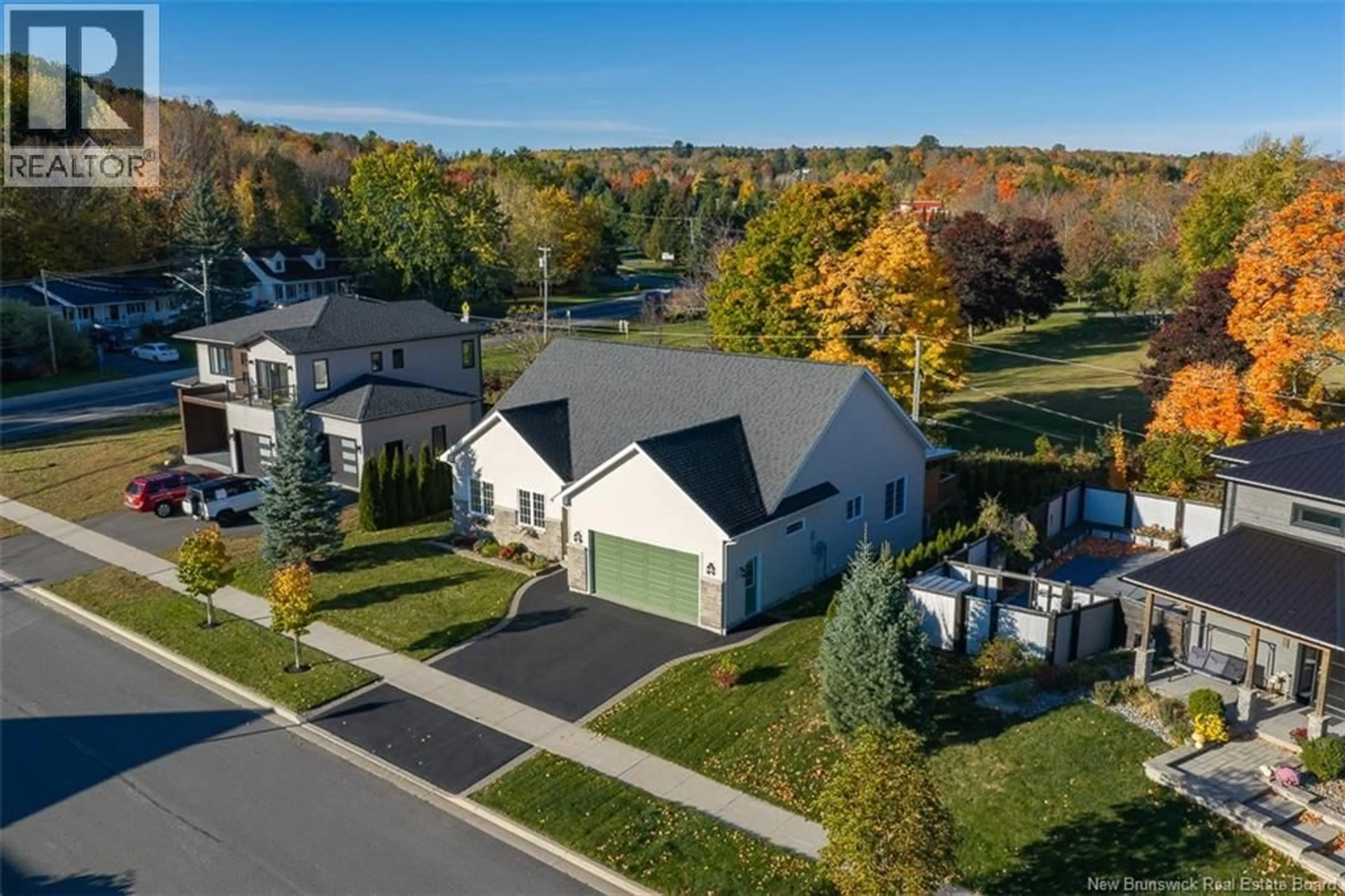 A pic from outside/outdoor area/front of a property/back of a property/a pic from drone, street for 138 STILL WATER CRESCENT, Fredericton New Brunswick E3B0V8