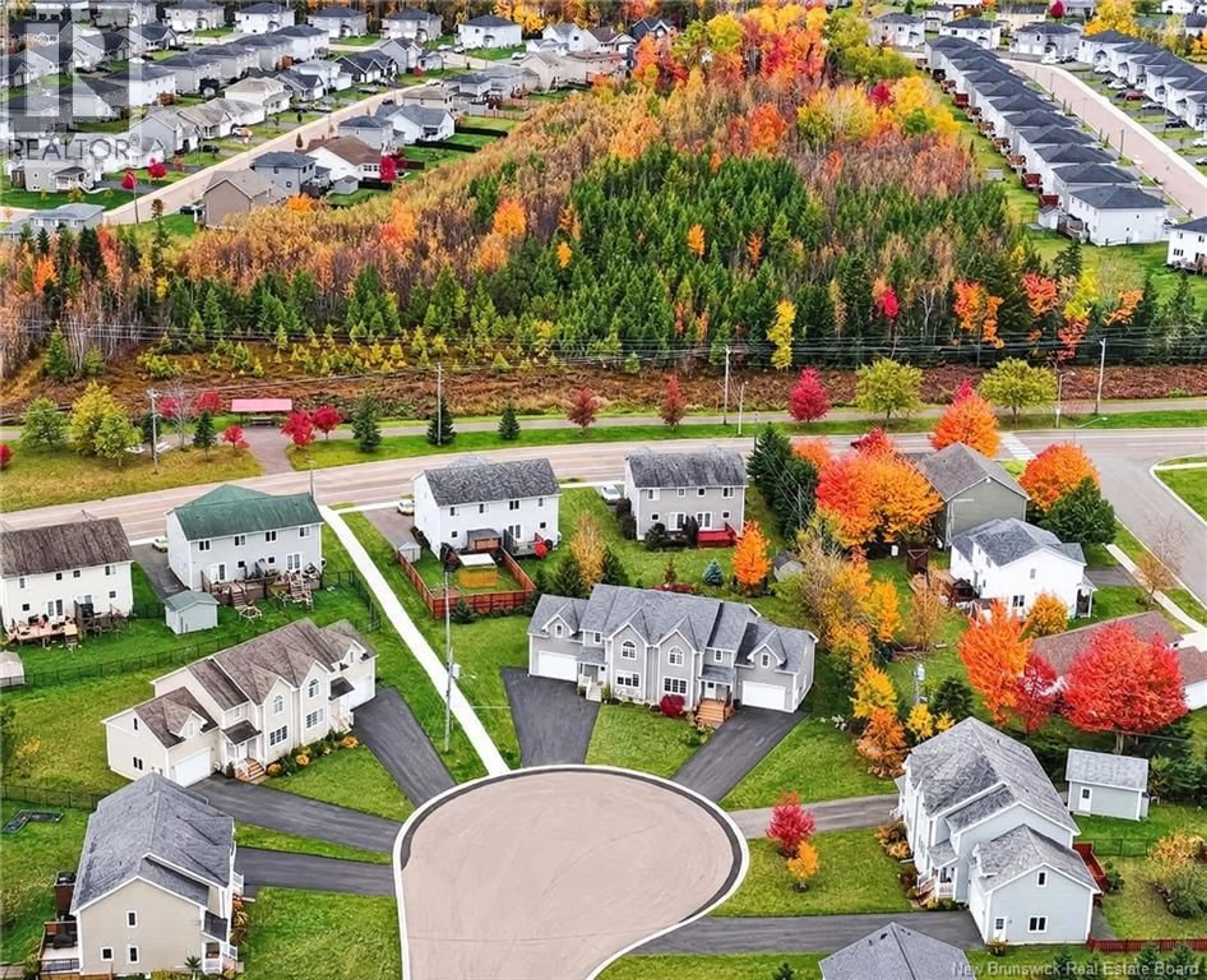 A pic from outside/outdoor area/front of a property/back of a property/a pic from drone, street for 125 RAINFORD COURT, Moncton New Brunswick E1G0Y3