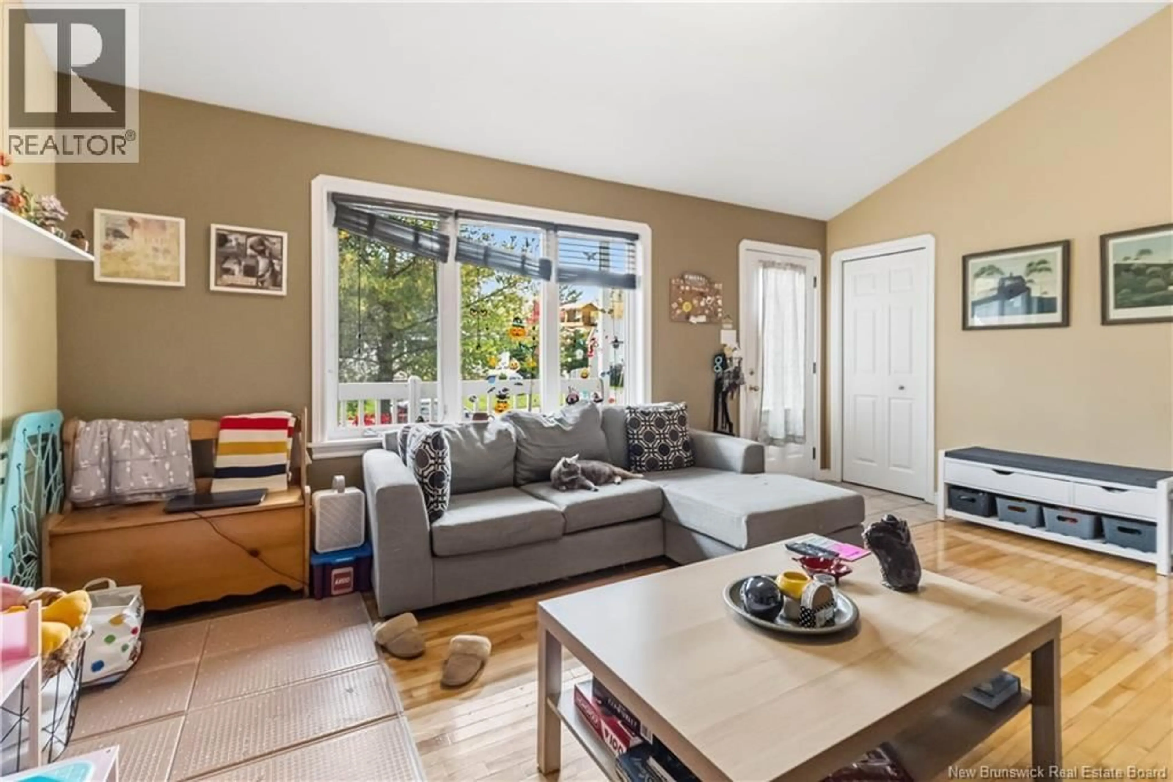 Living room with furniture, unknown for 107 RUE CYRIL, Dieppe New Brunswick E1A8R7
