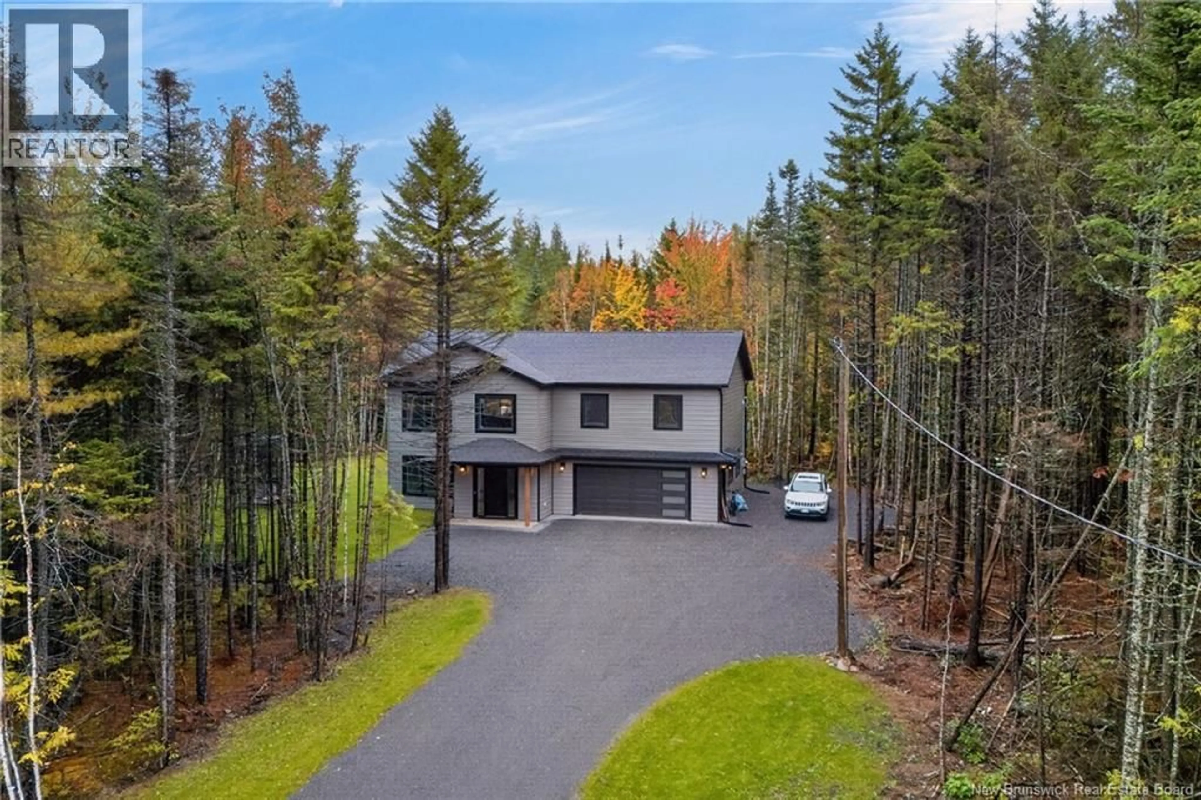 A pic from outside/outdoor area/front of a property/back of a property/a pic from drone, forest/trees view for 17 EAGLES LANE, Killarney Road New Brunswick E3A6E7