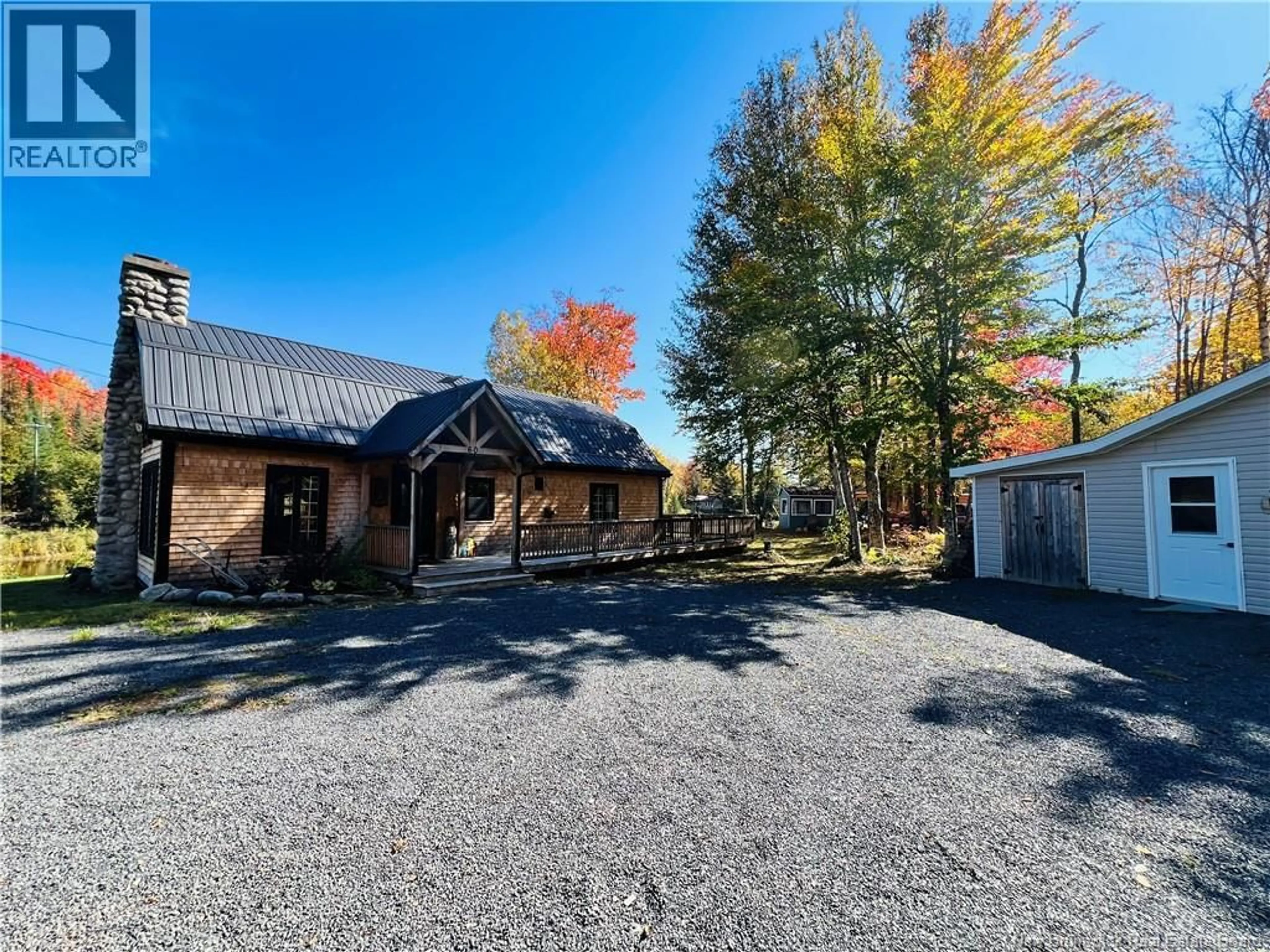 A pic from outside/outdoor area/front of a property/back of a property/a pic from drone, street for 60 MILL ROAD ROAD, Flume Ridge New Brunswick E6K0B4