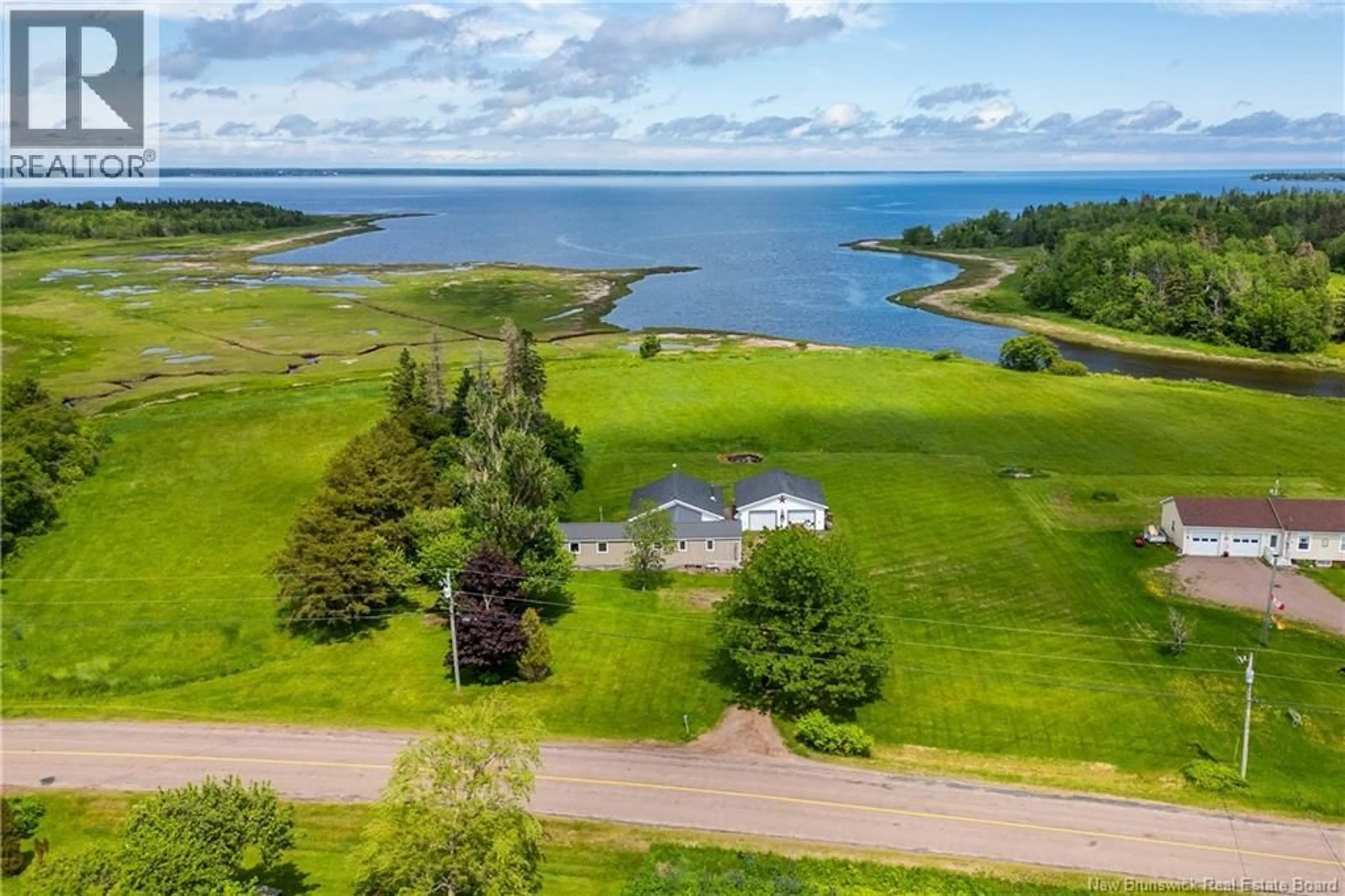 A pic from outside/outdoor area/front of a property/back of a property/a pic from drone, water/lake/river/ocean view for 708 ROUTE 970, Baie Verte New Brunswick E4M1Y5