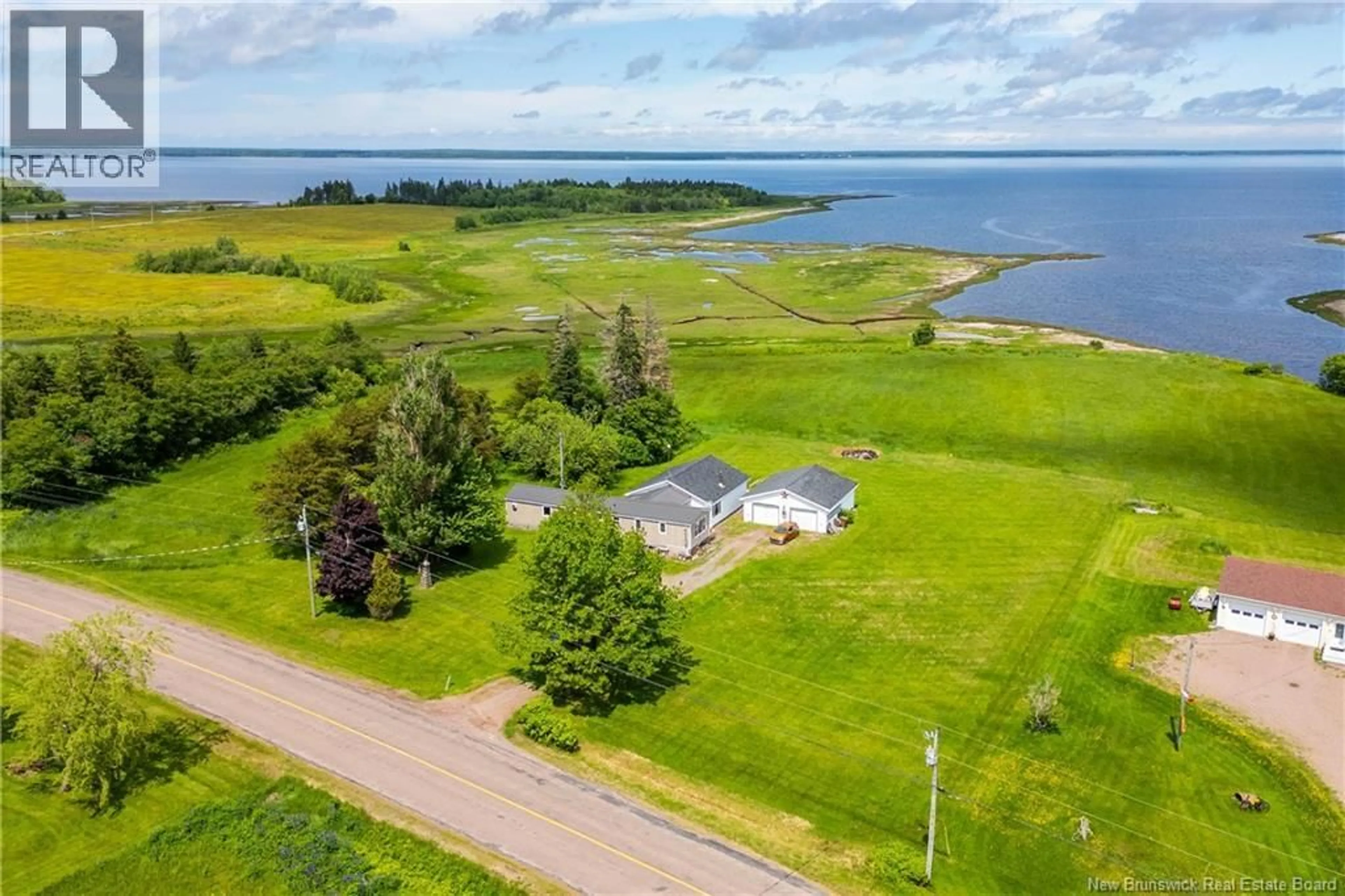 A pic from outside/outdoor area/front of a property/back of a property/a pic from drone, water/lake/river/ocean view for 708 ROUTE 970, Baie Verte New Brunswick E4M1Y5