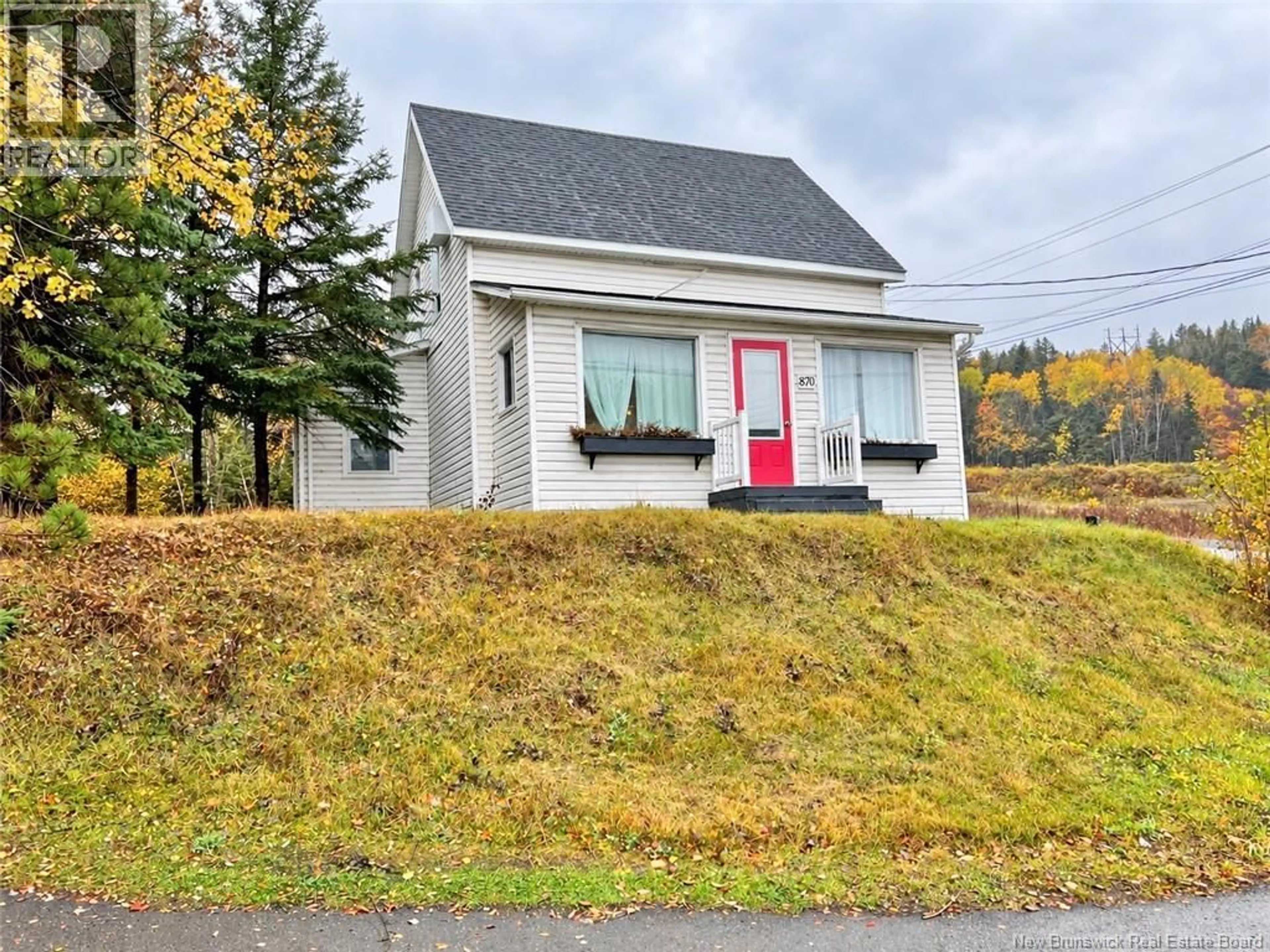 Home with vinyl exterior material, street for 870 CANADA ROAD, Edmundston New Brunswick E3V3X3