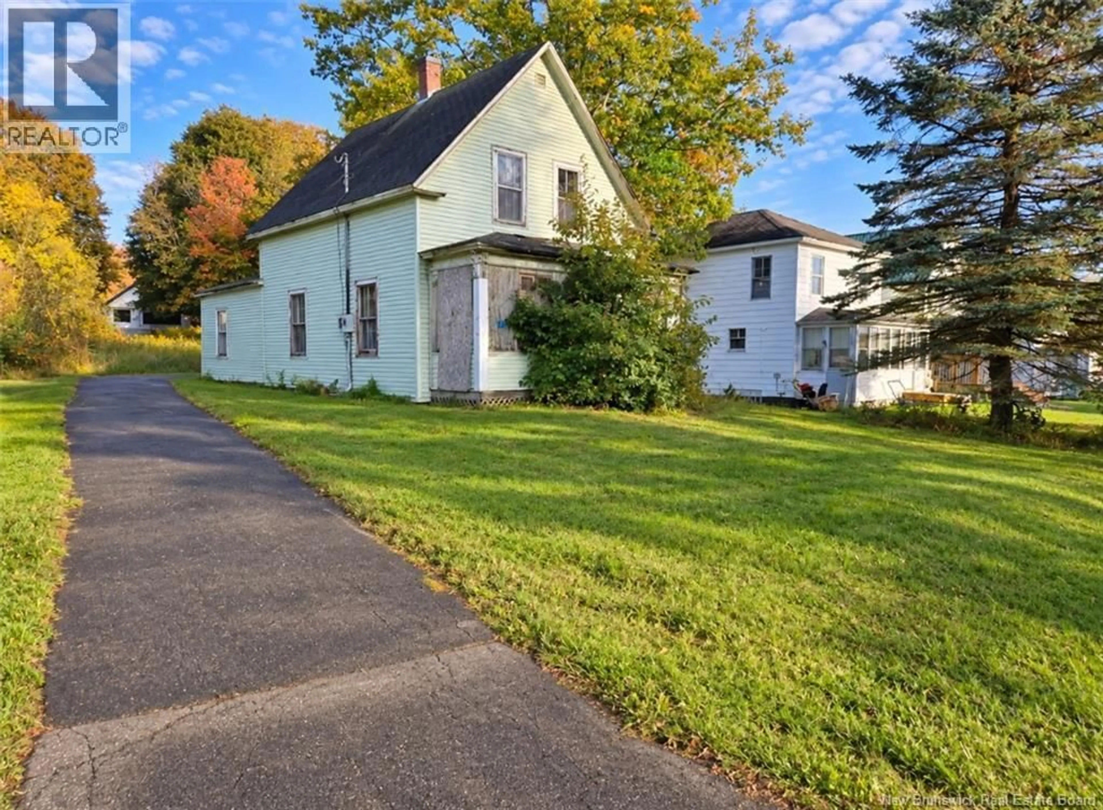A pic from outside/outdoor area/front of a property/back of a property/a pic from drone, street for 47 HIGHLAND AVENUE, McAdam New Brunswick E6J1H7
