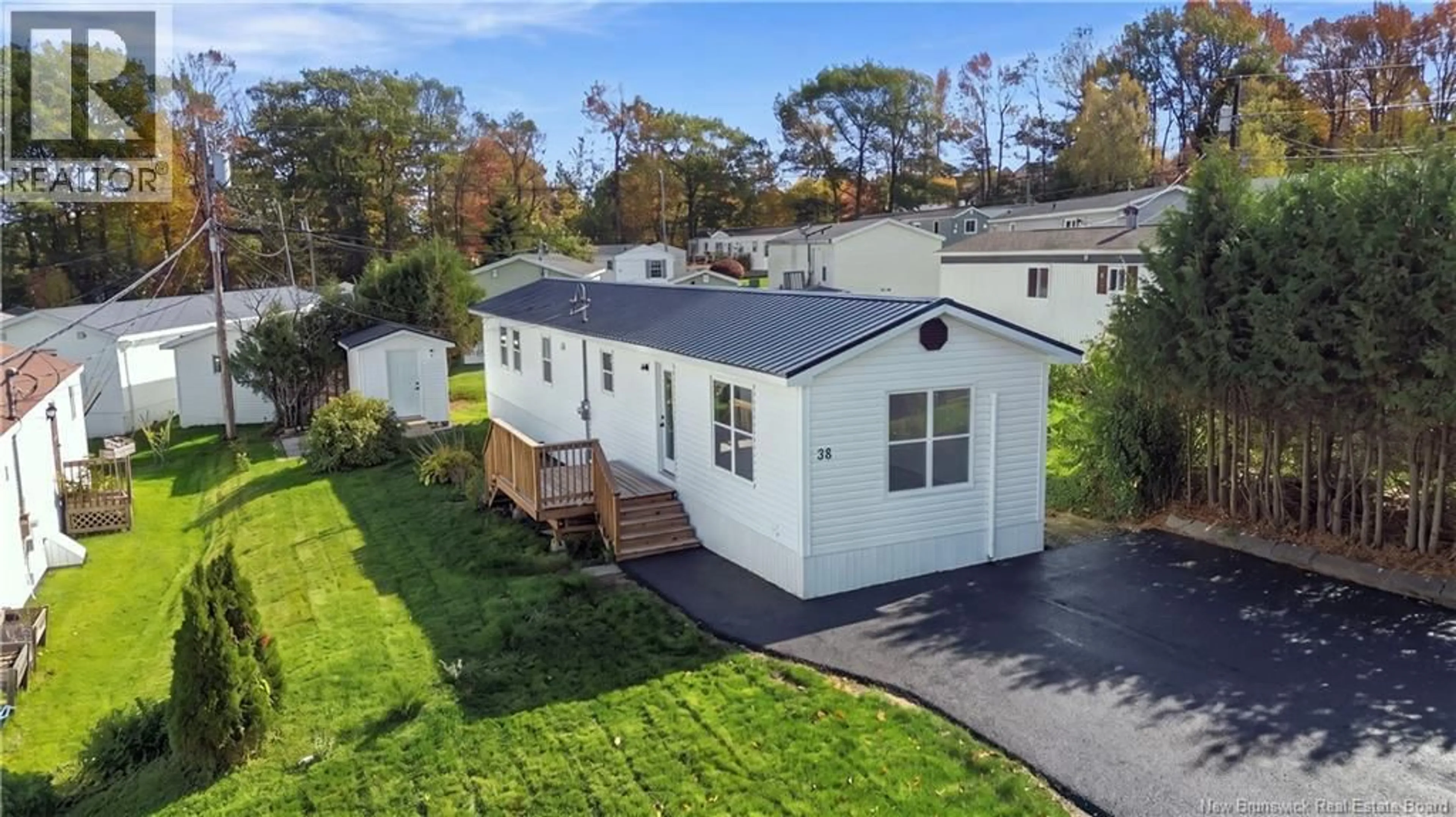 A pic from outside/outdoor area/front of a property/back of a property/a pic from drone, street for 38 BAYBERRY STREET, Fredericton New Brunswick E3C1L8