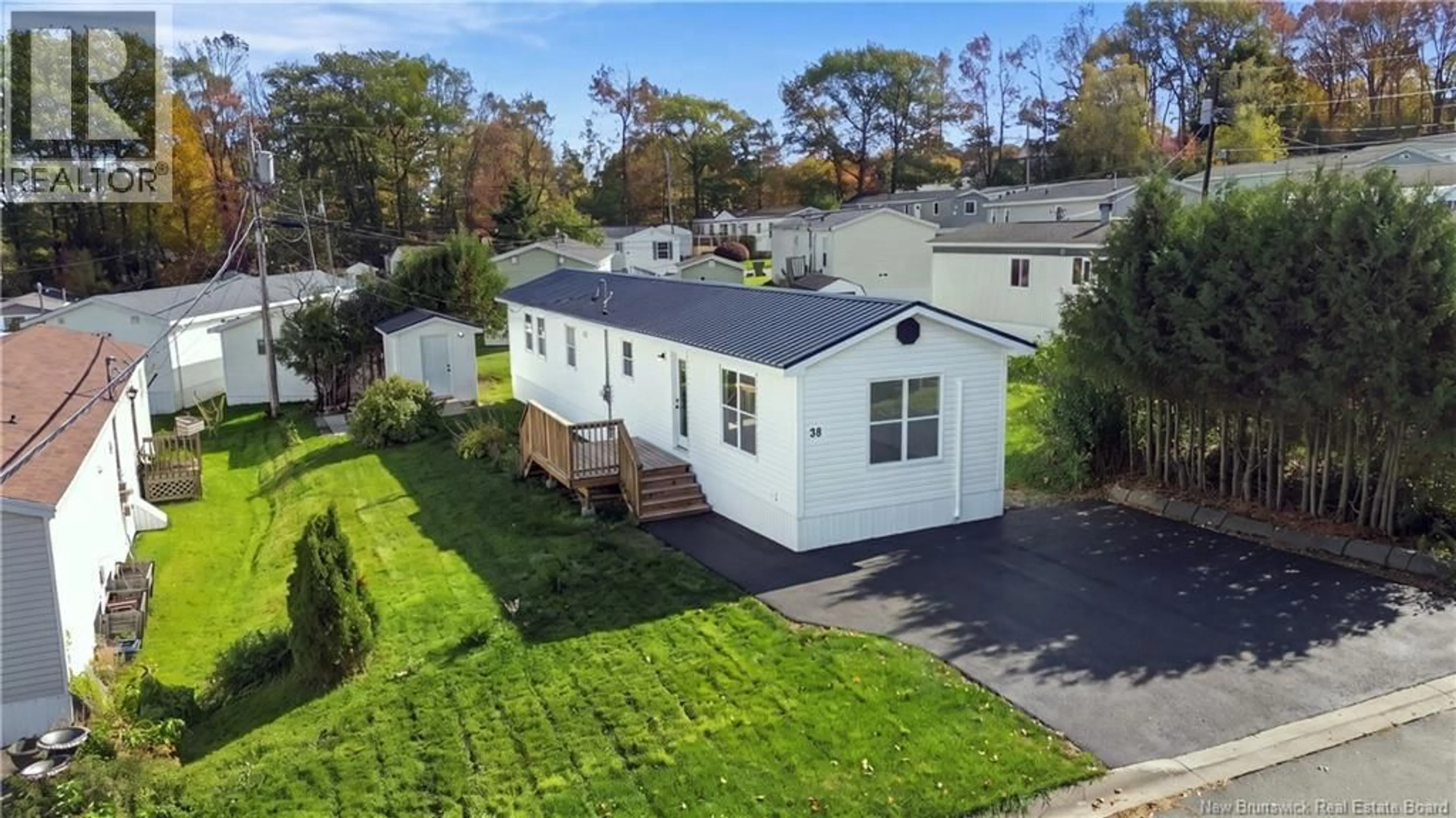 A pic from outside/outdoor area/front of a property/back of a property/a pic from drone, street for 38 BAYBERRY STREET, Fredericton New Brunswick E3C1L8