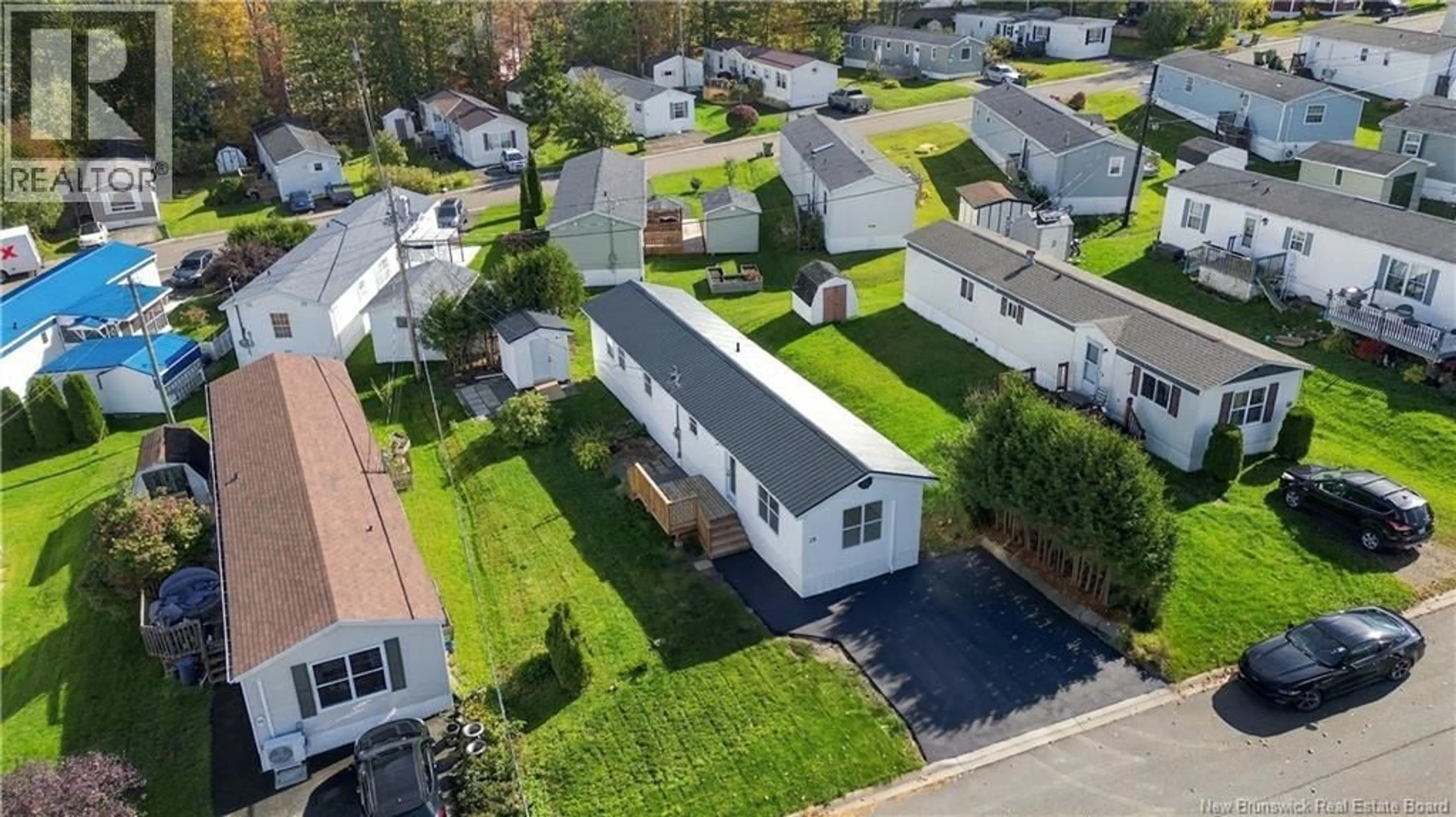 A pic from outside/outdoor area/front of a property/back of a property/a pic from drone, street for 38 BAYBERRY STREET, Fredericton New Brunswick E3C1L8