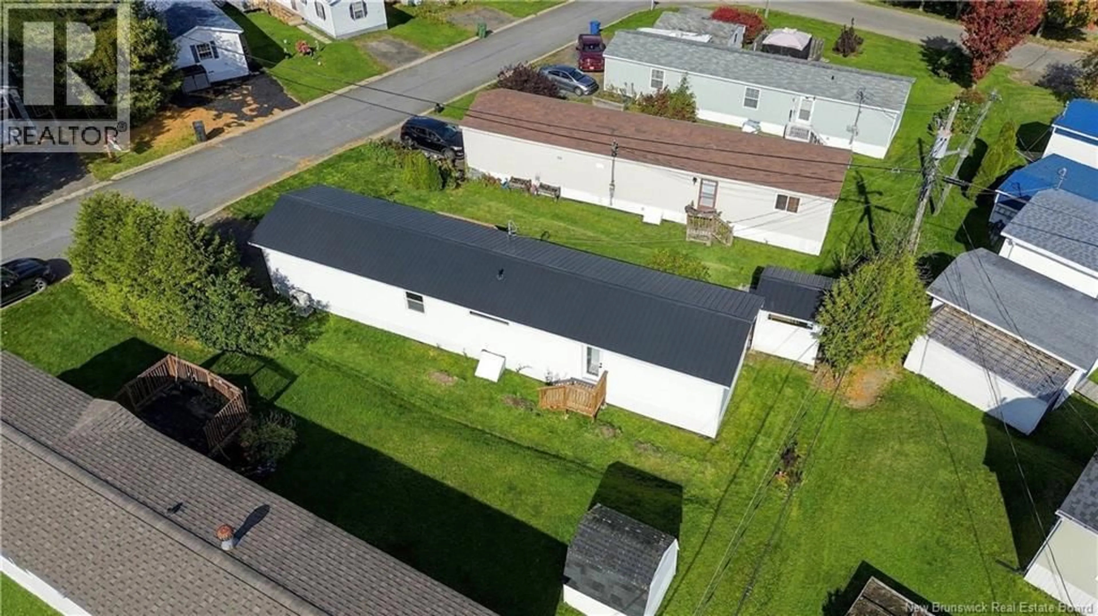 A pic from outside/outdoor area/front of a property/back of a property/a pic from drone, street for 38 BAYBERRY STREET, Fredericton New Brunswick E3C1L8