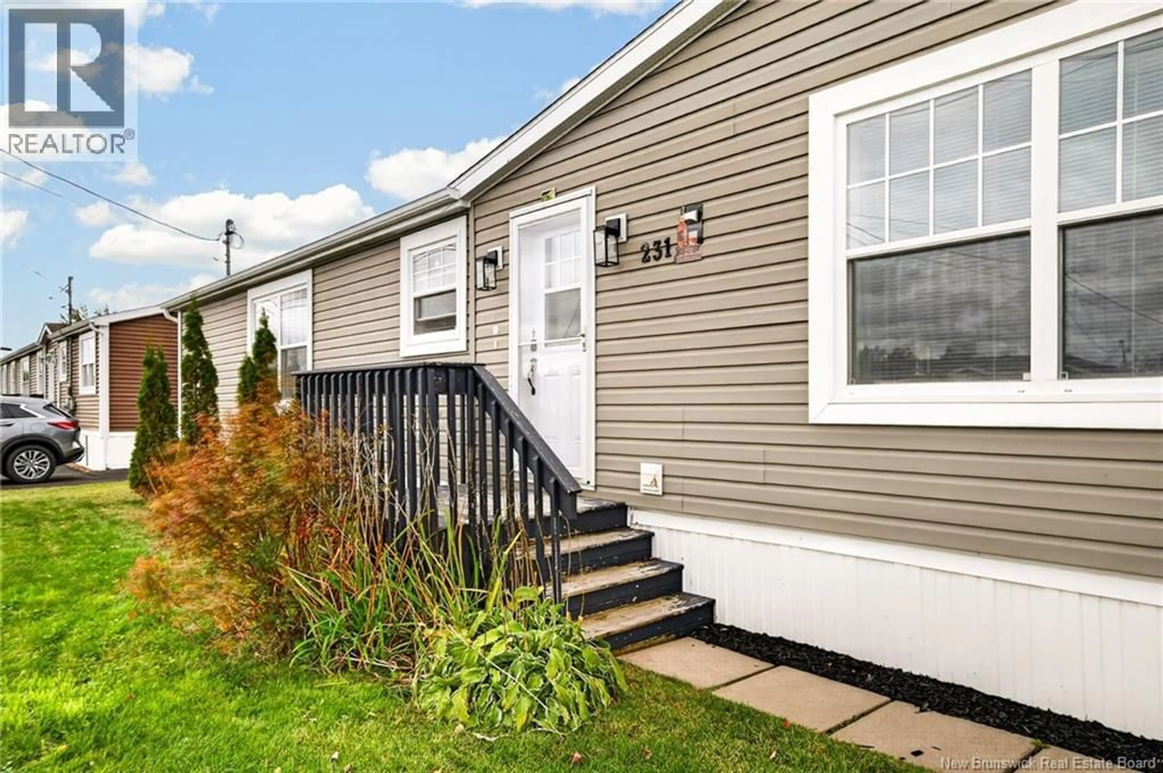 Home with vinyl exterior material, street for 231 BONAVENTURE STREET, Shediac New Brunswick E4P0G9