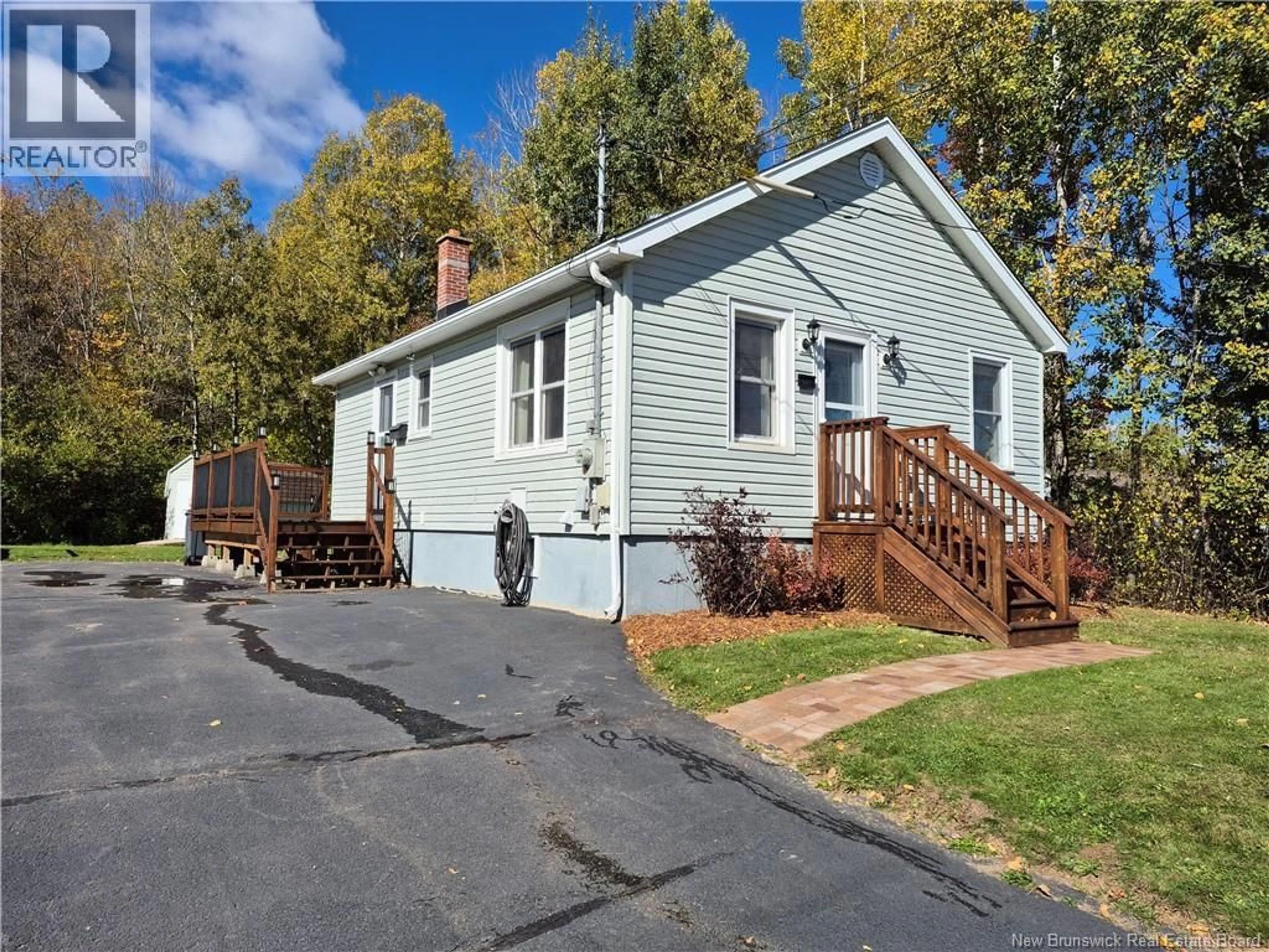 Home with vinyl exterior material, street for 557 CANADA STREET, Marysville New Brunswick E3A4A8