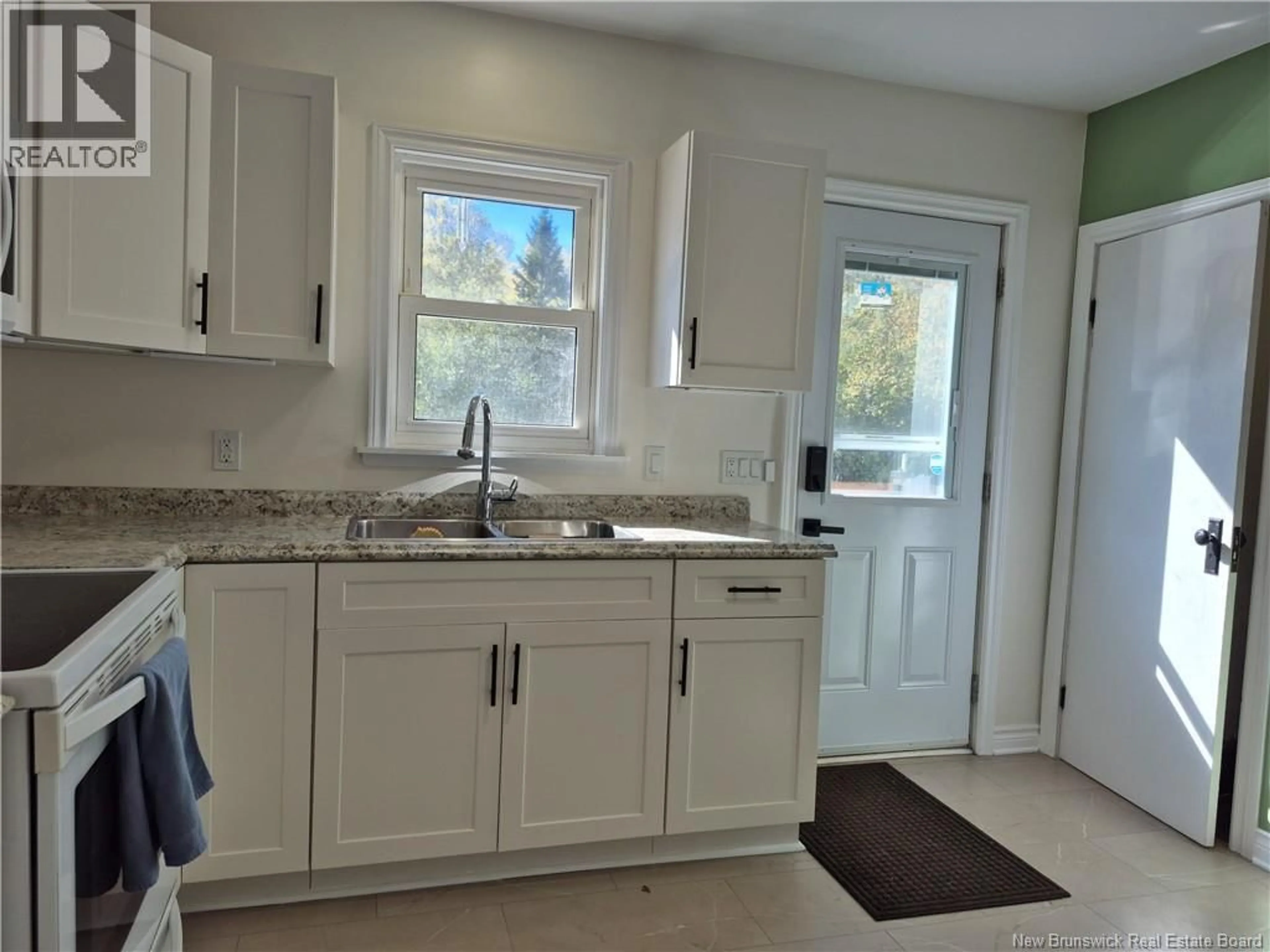 Open concept kitchen, ceramic/tile floor for 557 CANADA STREET, Marysville New Brunswick E3A4A8