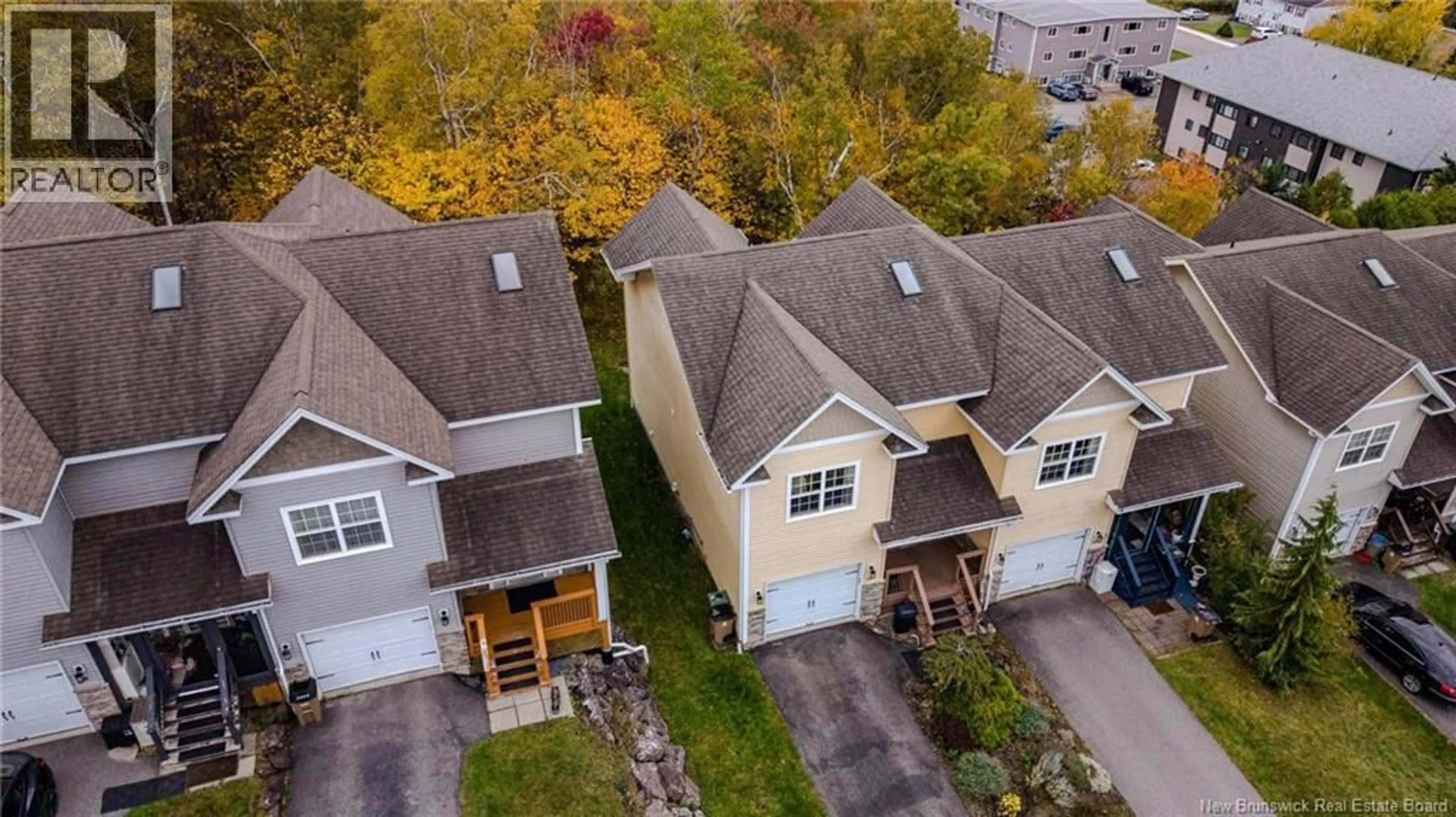 A pic from outside/outdoor area/front of a property/back of a property/a pic from drone, street for 28 NOEL AVENUE, Saint John New Brunswick E2K4M2