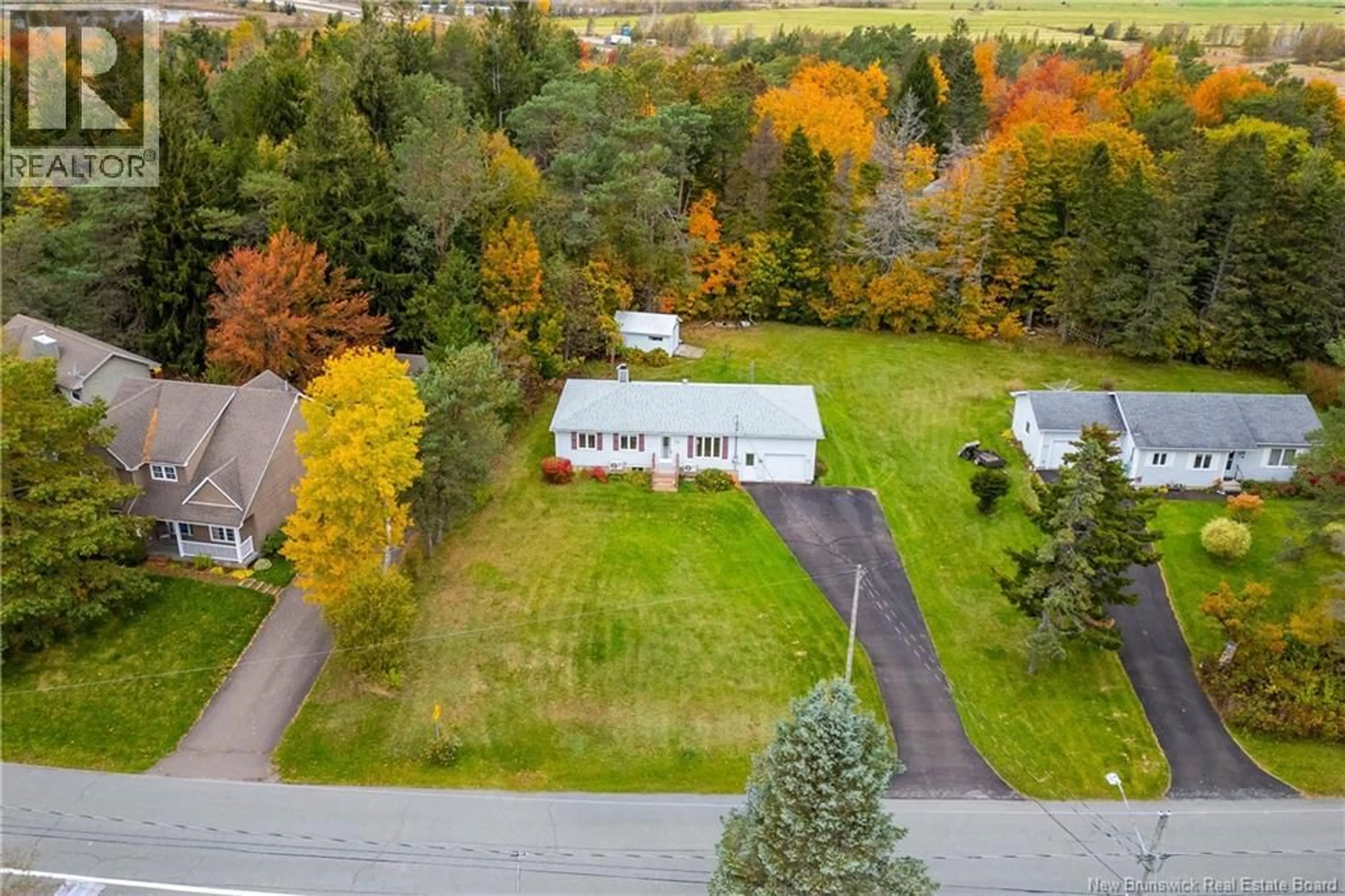 A pic from outside/outdoor area/front of a property/back of a property/a pic from drone, street for 18 HARRIS DRIVE, Sackville New Brunswick E4L3X6