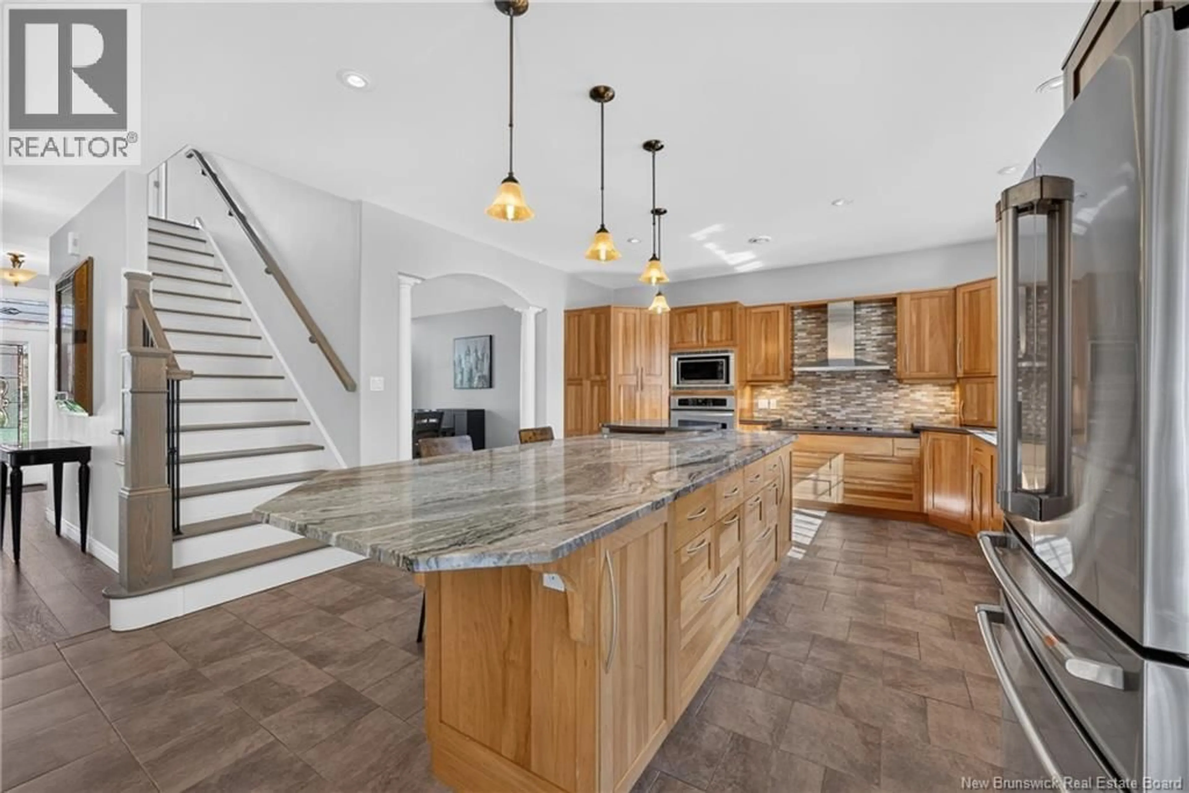 Open concept kitchen, ceramic/tile floor for 122 SUMMERHILL ROW, Fredericton New Brunswick E3G0E9