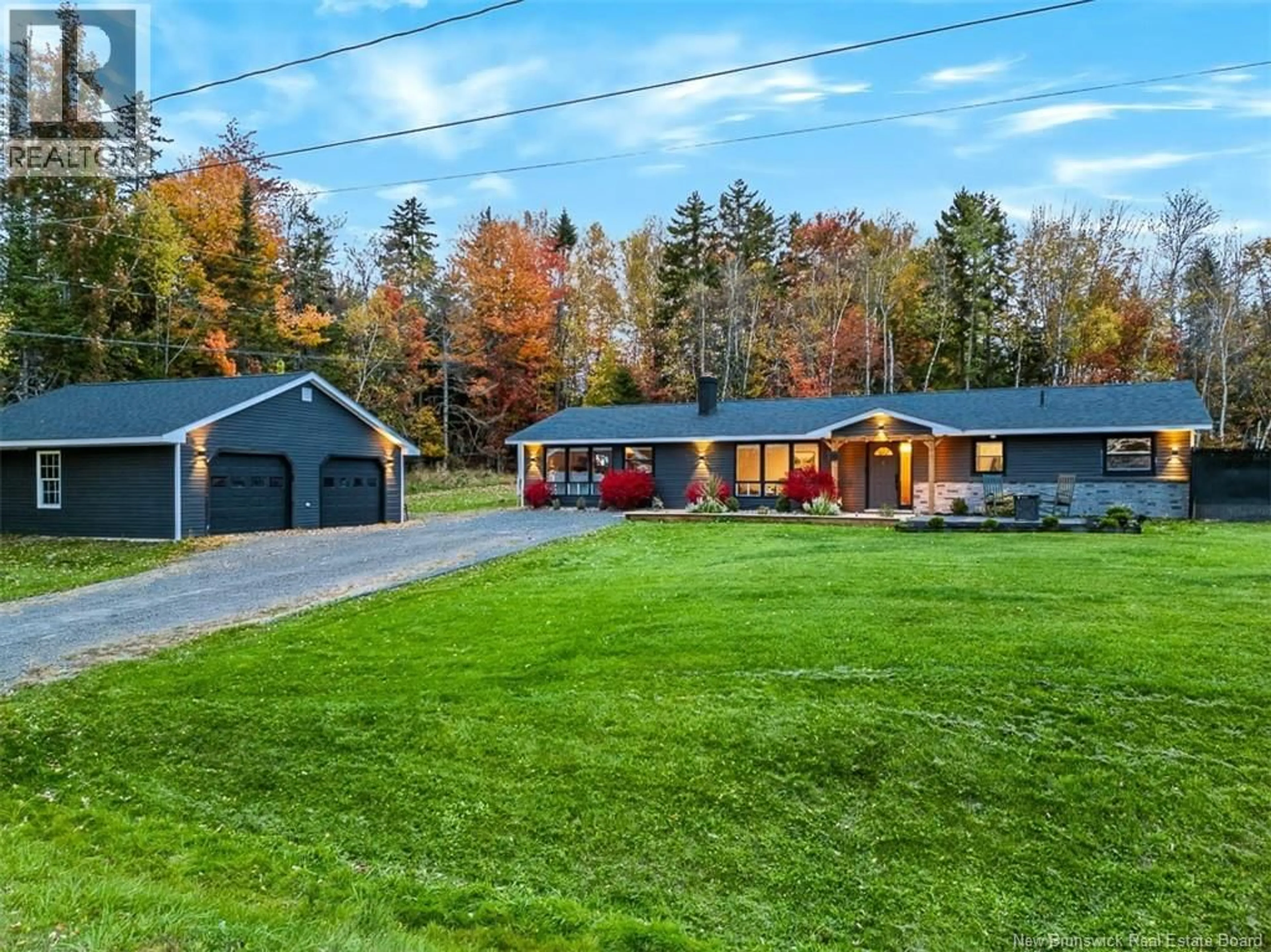 A pic from outside/outdoor area/front of a property/back of a property/a pic from drone, unknown for 10 SOMMERSET LANE, Douglas New Brunswick E3G8B1