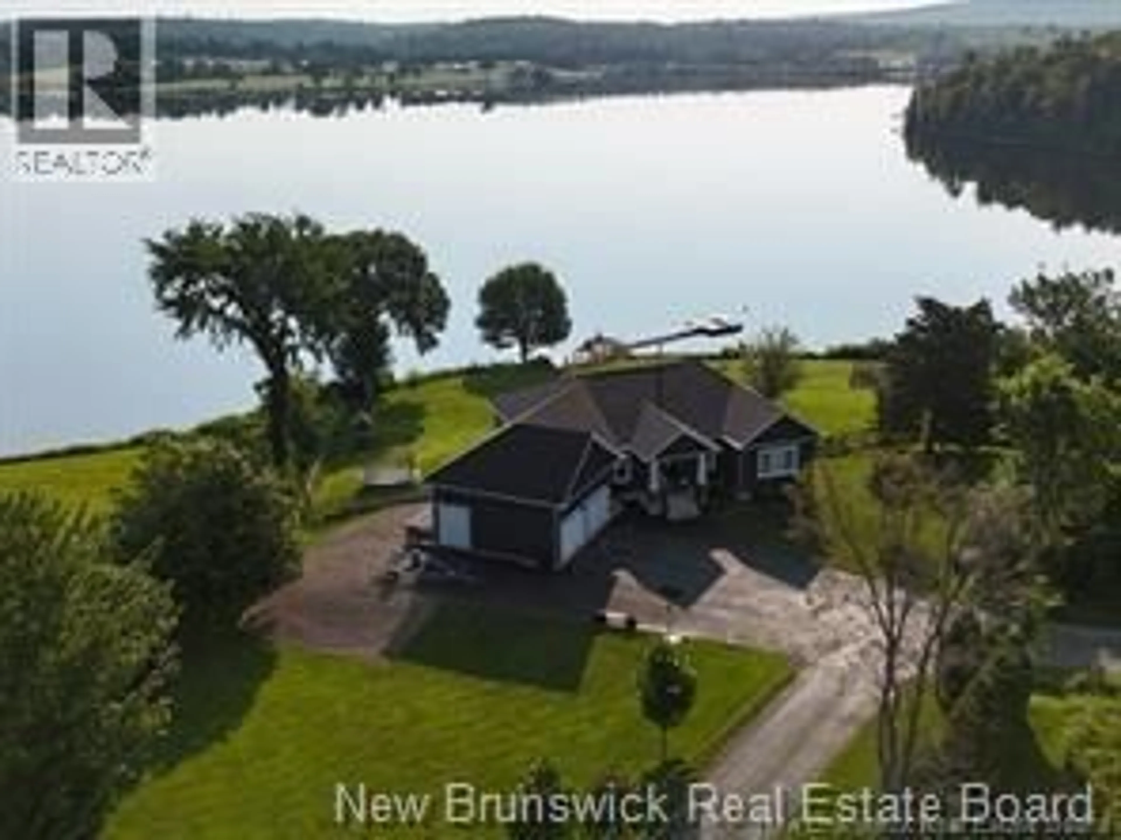 A pic from outside/outdoor area/front of a property/back of a property/a pic from drone, water/lake/river/ocean view for 50 SANDCASTLE LANE, Upper Kingsclear New Brunswick E3E0A4