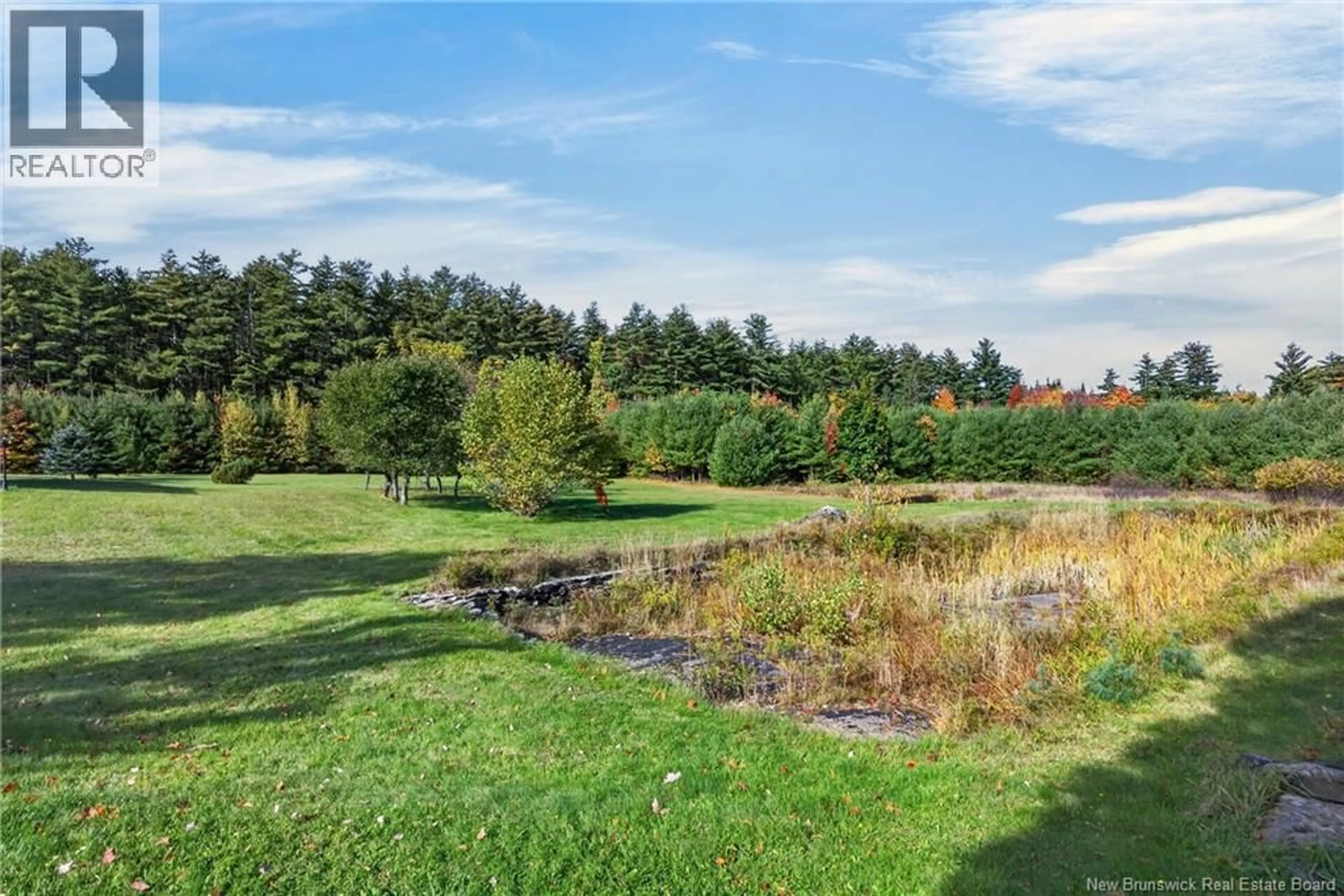 A pic from outside/outdoor area/front of a property/back of a property/a pic from drone, water/lake/river/ocean view for 164 GORE ROAD, Fredericton Junction New Brunswick E5L1T9