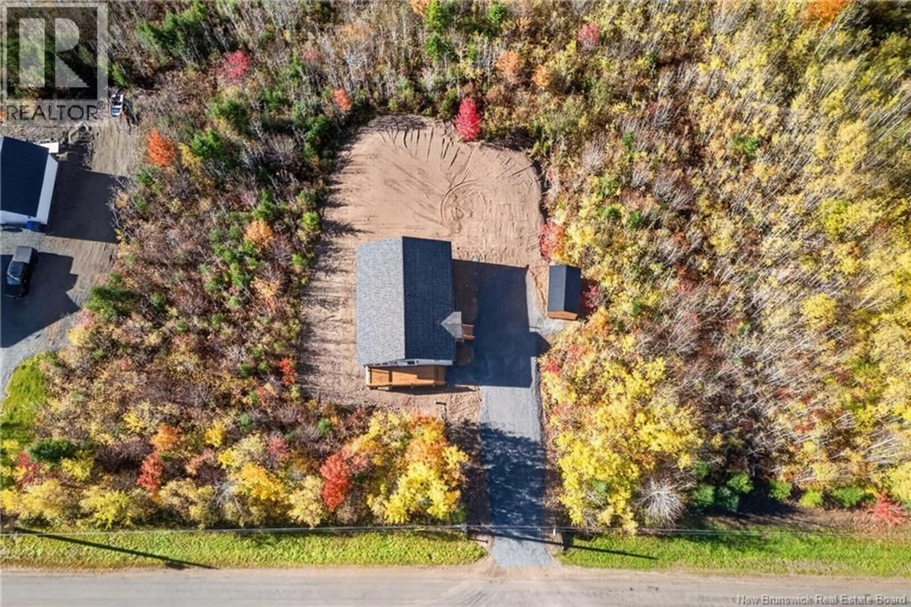 A pic from outside/outdoor area/front of a property/back of a property/a pic from drone, unknown for 100 WEBB ROAD, Tracy New Brunswick E5L1L6