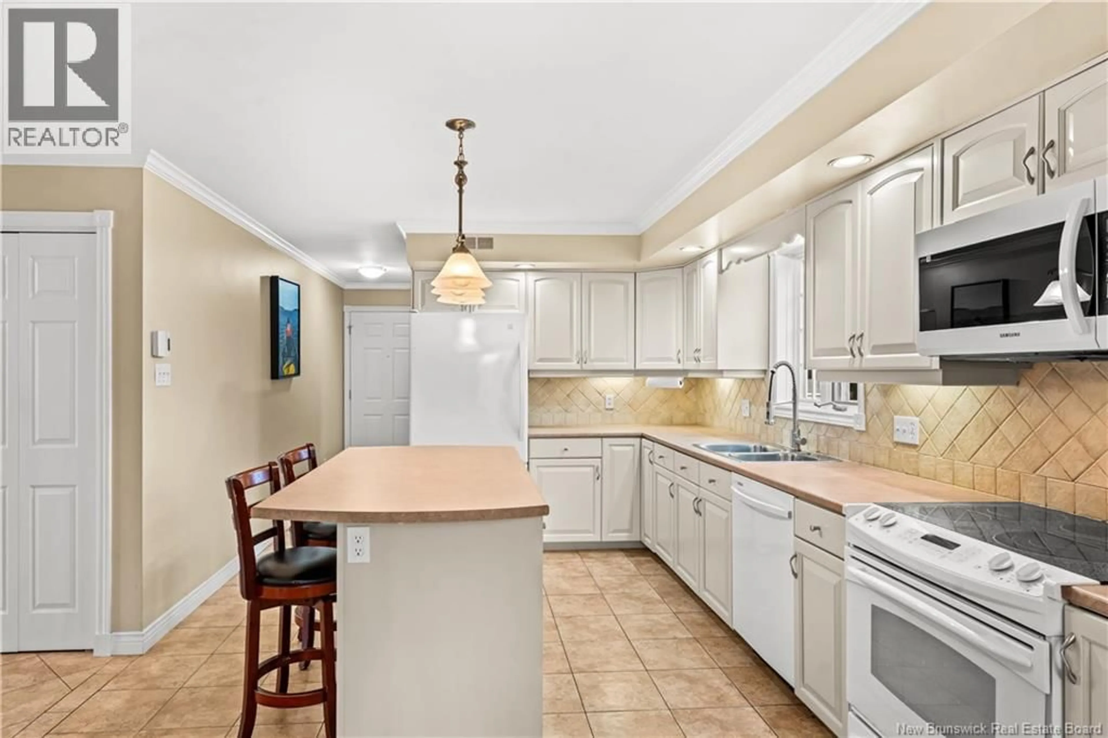 Standard kitchen, ceramic/tile floor for 90 RUE ACADIE, Bouctouche New Brunswick E4S2T4