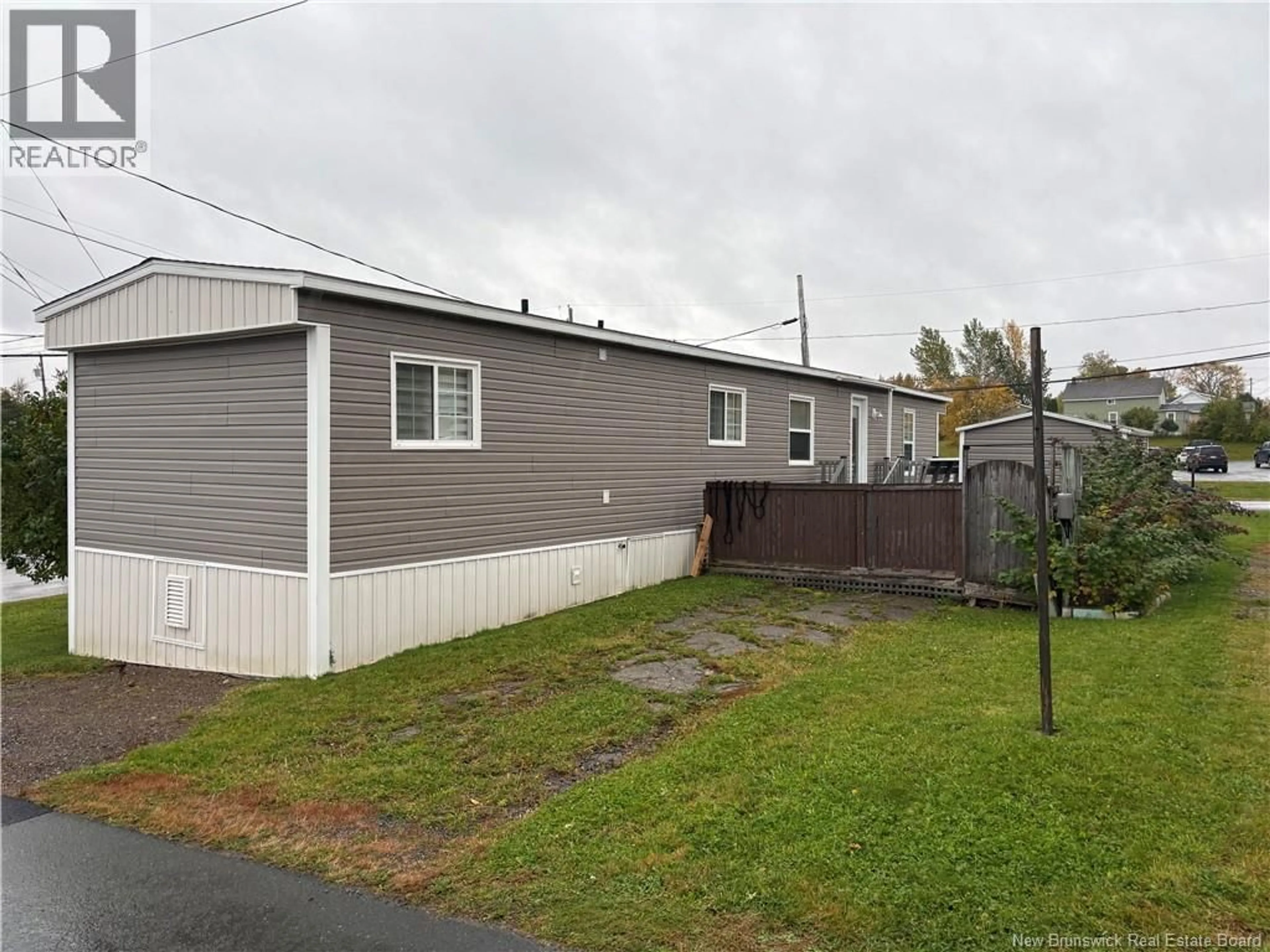 Home with vinyl exterior material, street for 610 COLLEGE STREET, Bathurst New Brunswick E2A2T6