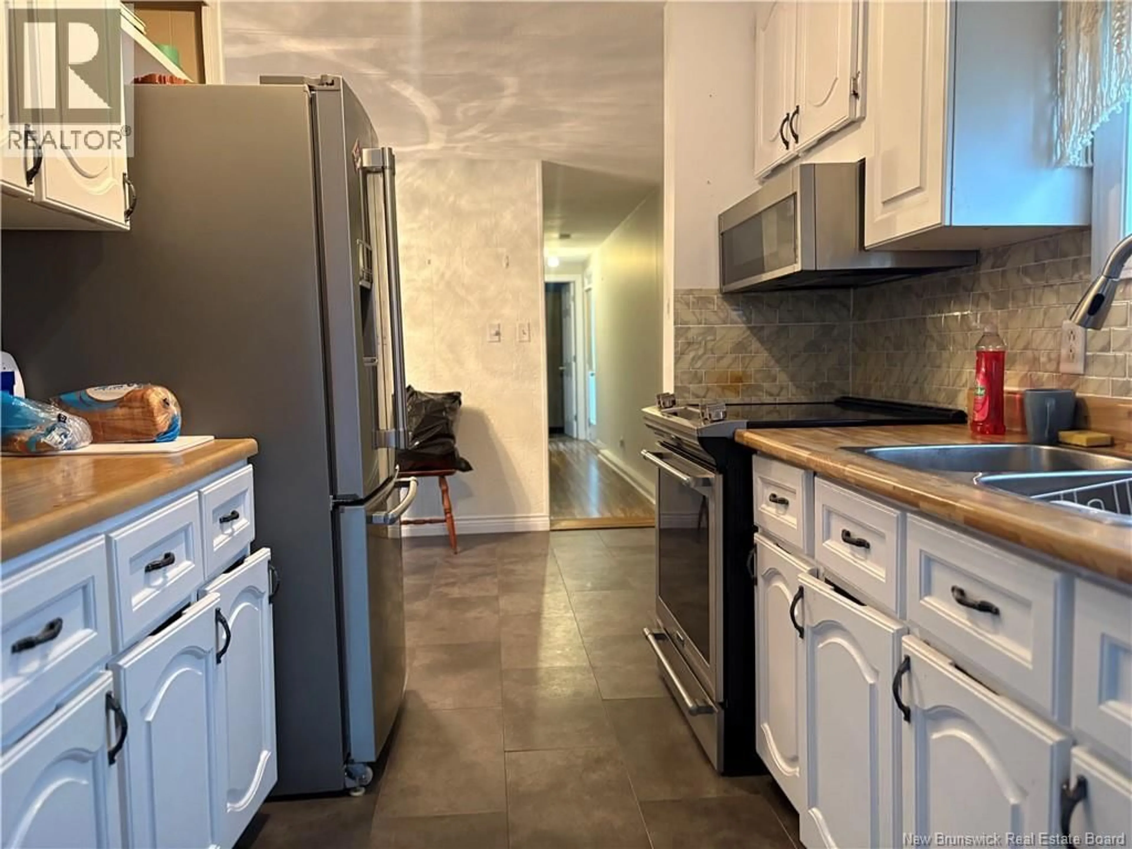 Standard kitchen, ceramic/tile floor for 610 COLLEGE STREET, Bathurst New Brunswick E2A2T6