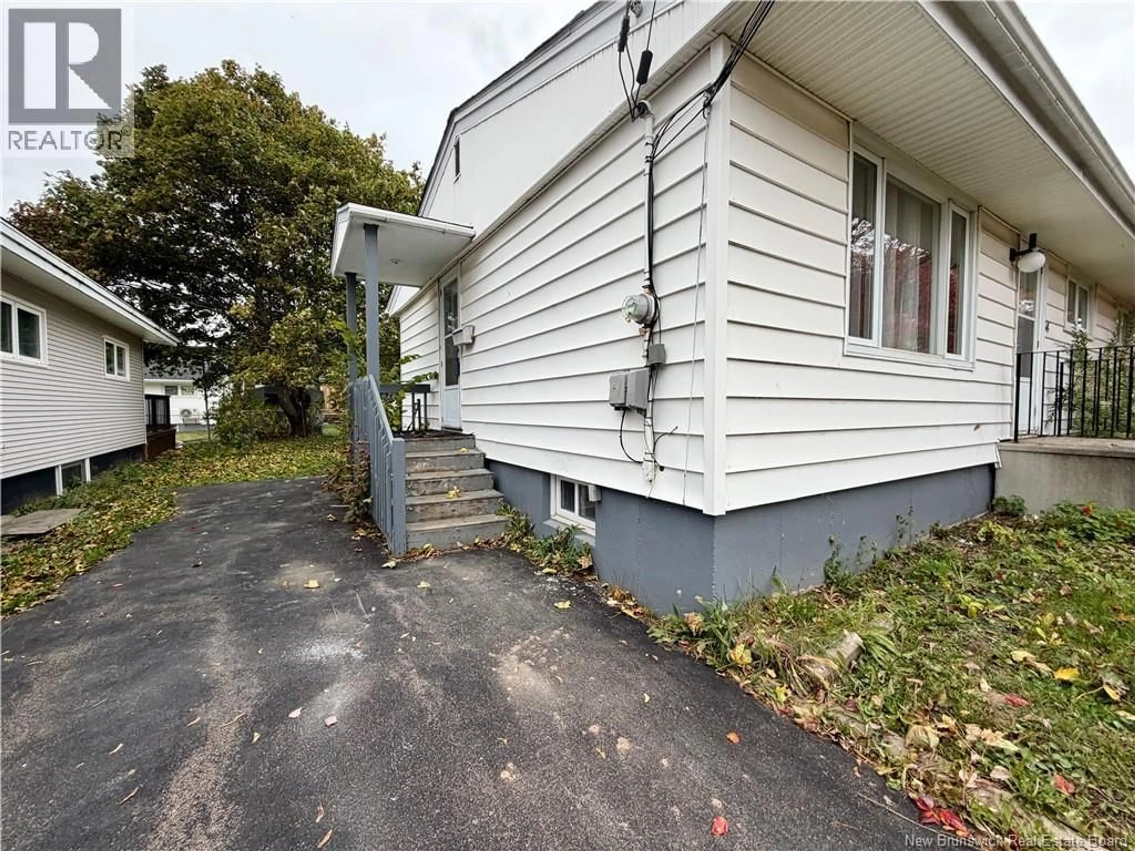 A pic from outside/outdoor area/front of a property/back of a property/a pic from drone, street for 34 HEDGEWOOD DRIVE, Moncton New Brunswick E1E2W3