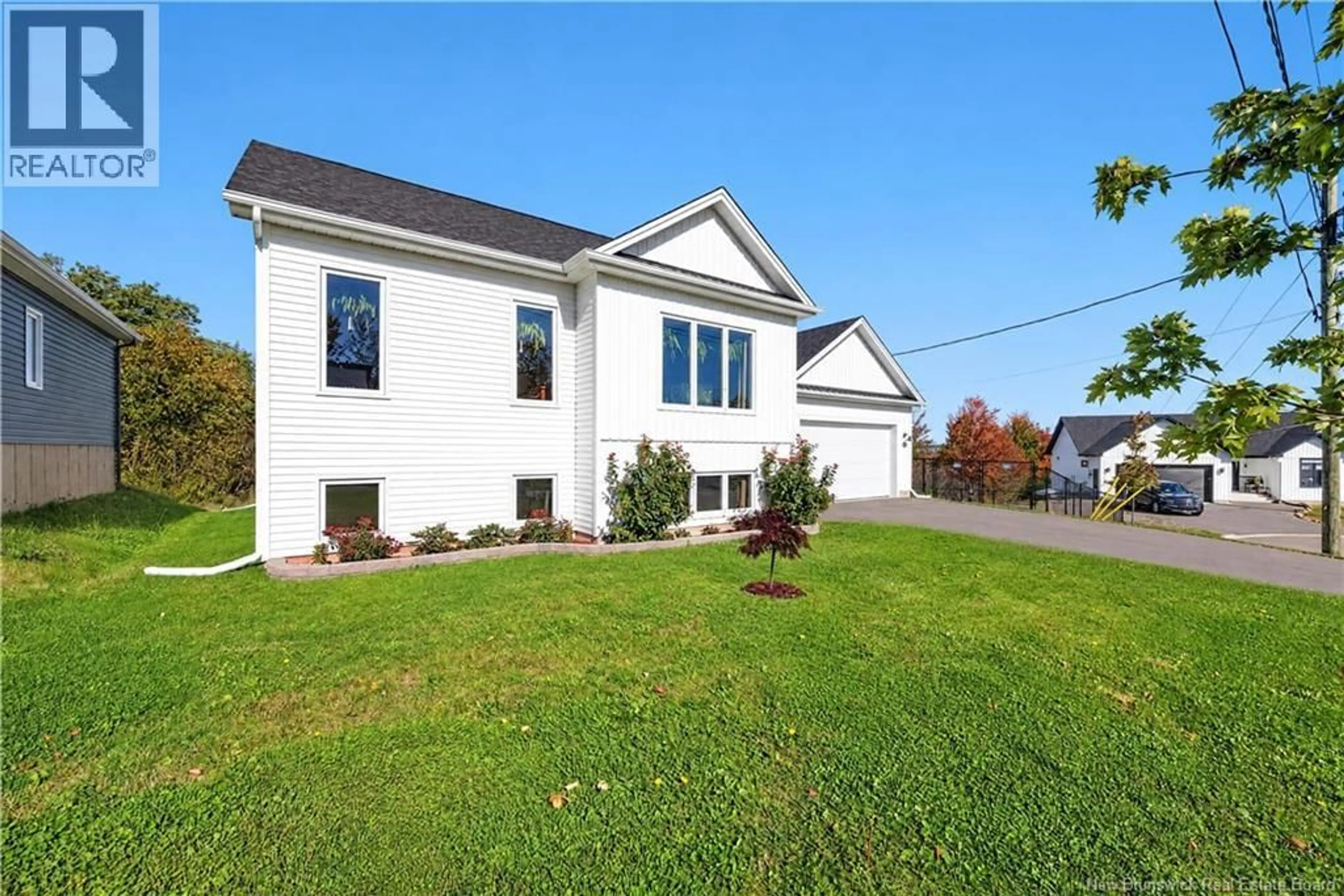 Home with vinyl exterior material, street for 18 ORIN DRIVE, Riverview New Brunswick E1B3X5