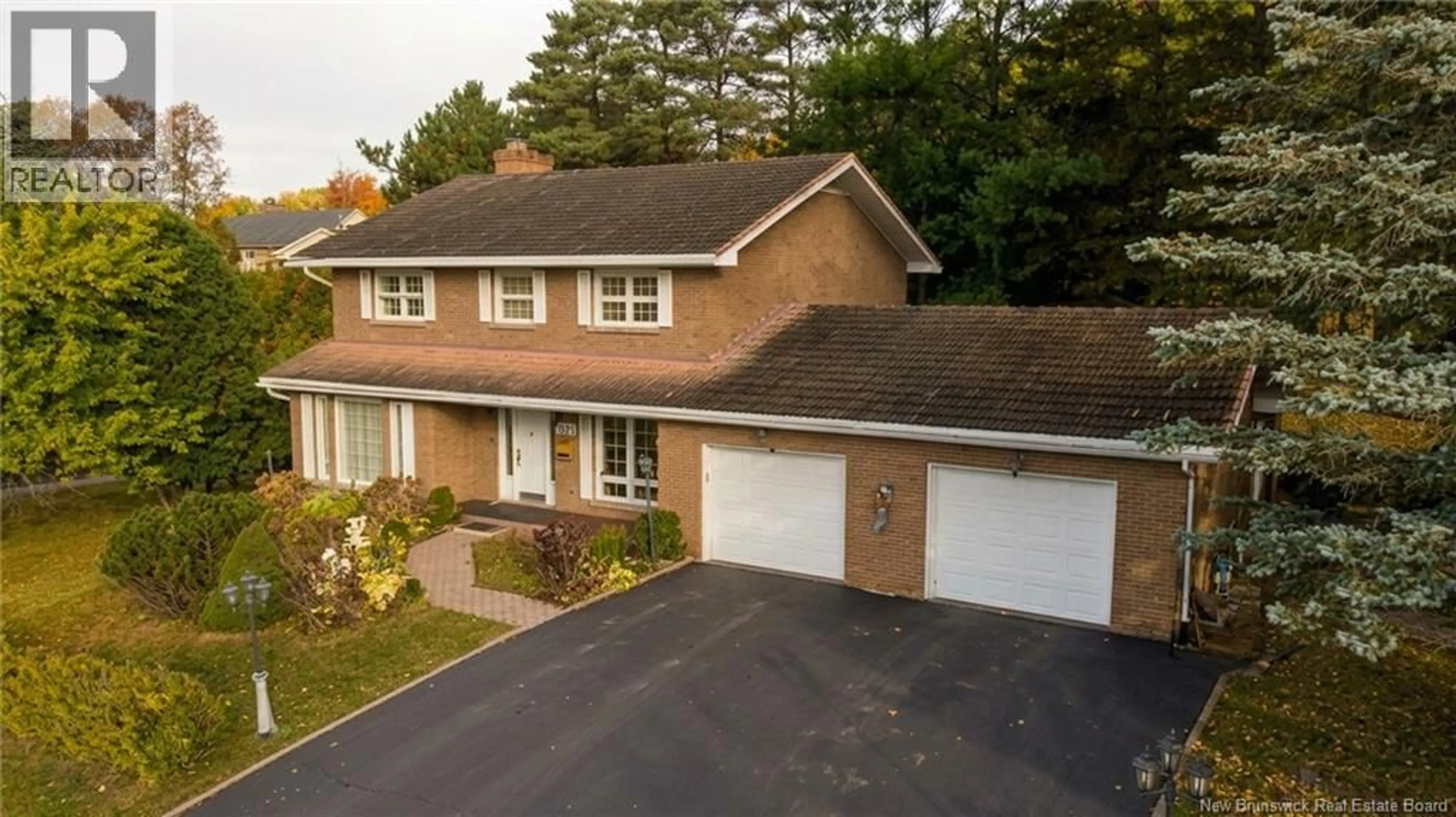 A pic from outside/outdoor area/front of a property/back of a property/a pic from drone, street for 211 BELLEVUE STREET, Edmundston New Brunswick E3V2E4