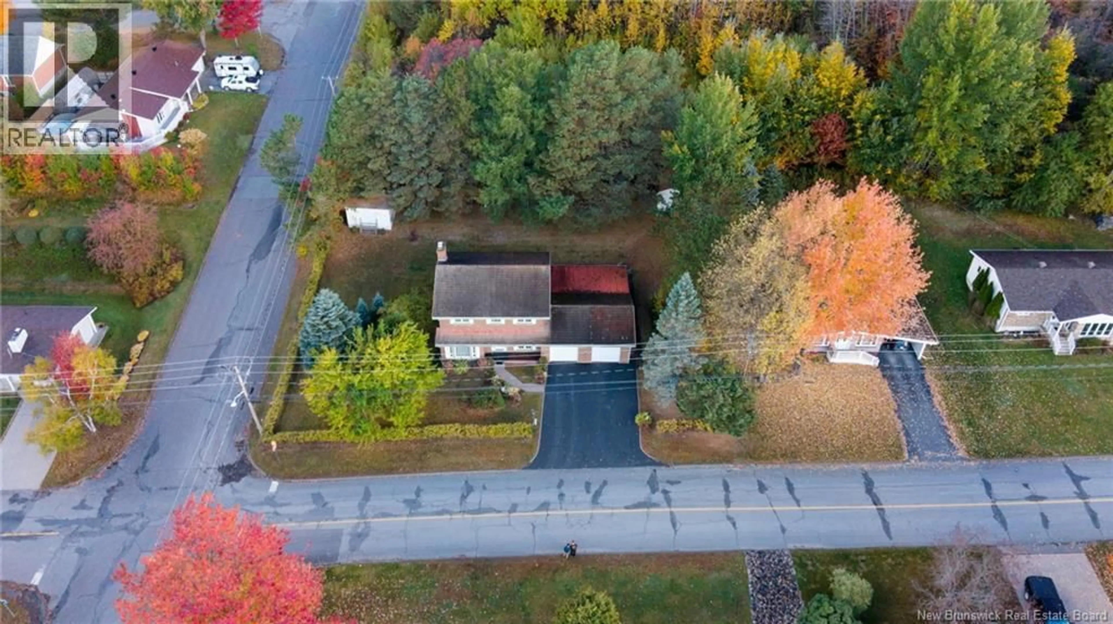 A pic from outside/outdoor area/front of a property/back of a property/a pic from drone, street for 211 BELLEVUE STREET, Edmundston New Brunswick E3V2E4