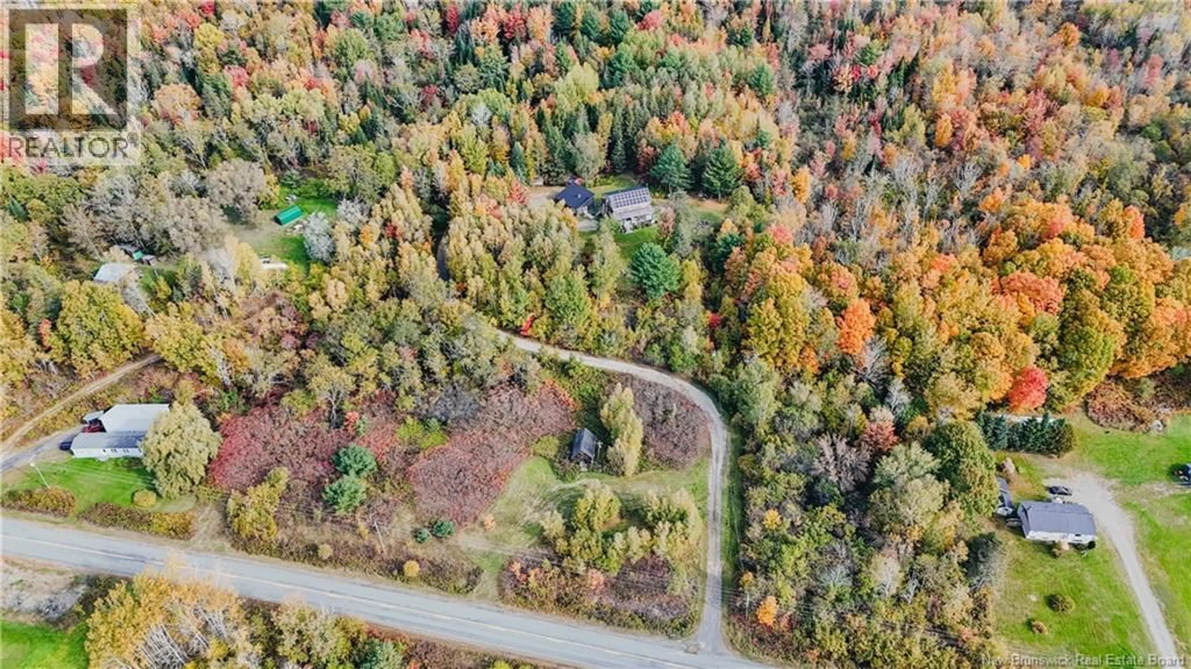 A pic from outside/outdoor area/front of a property/back of a property/a pic from drone, forest/trees view for 1980 ROUTE 105, Southampton New Brunswick E6G1M8