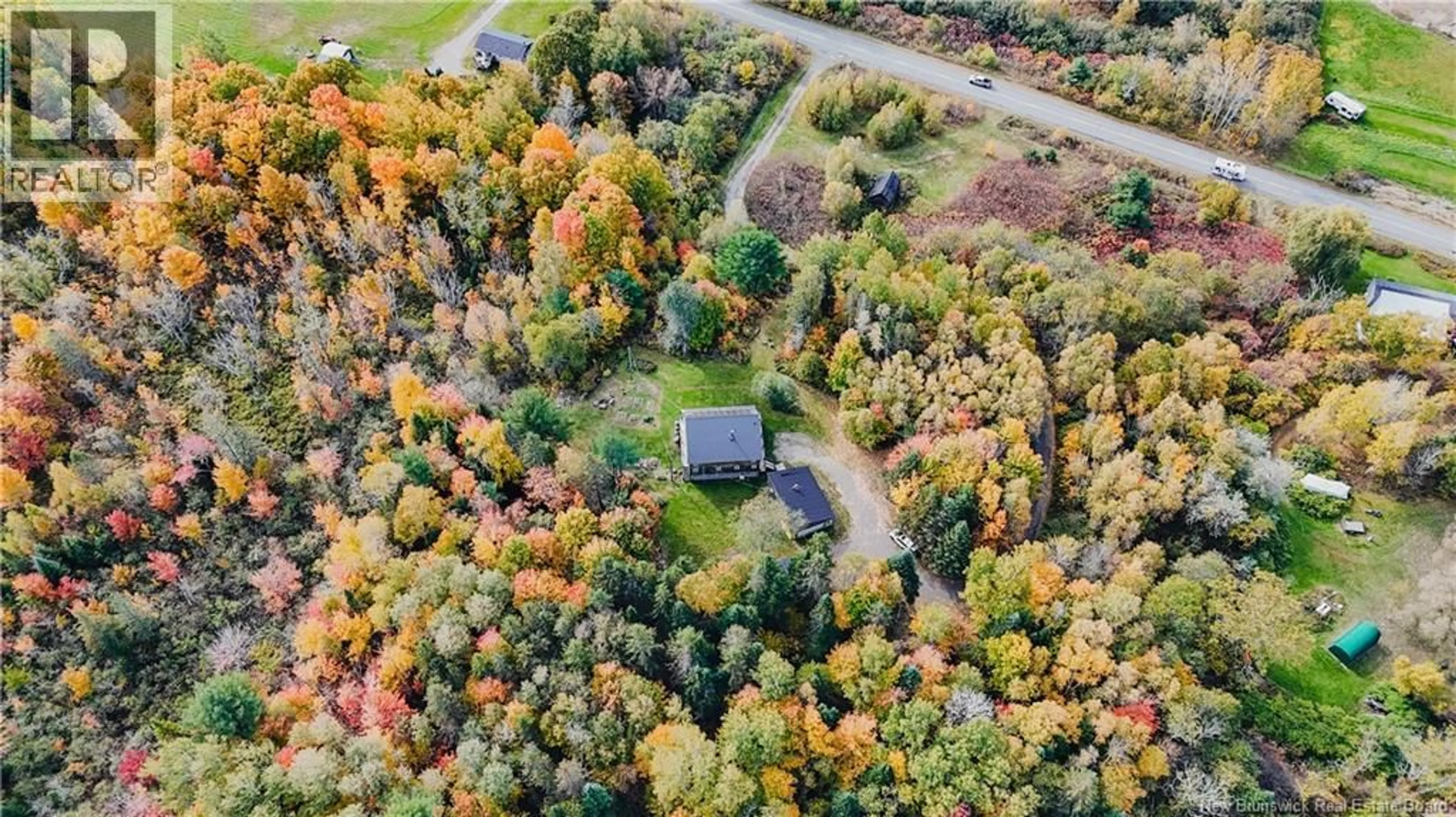 A pic from outside/outdoor area/front of a property/back of a property/a pic from drone, forest/trees view for 1980 ROUTE 105, Southampton New Brunswick E6G1M8
