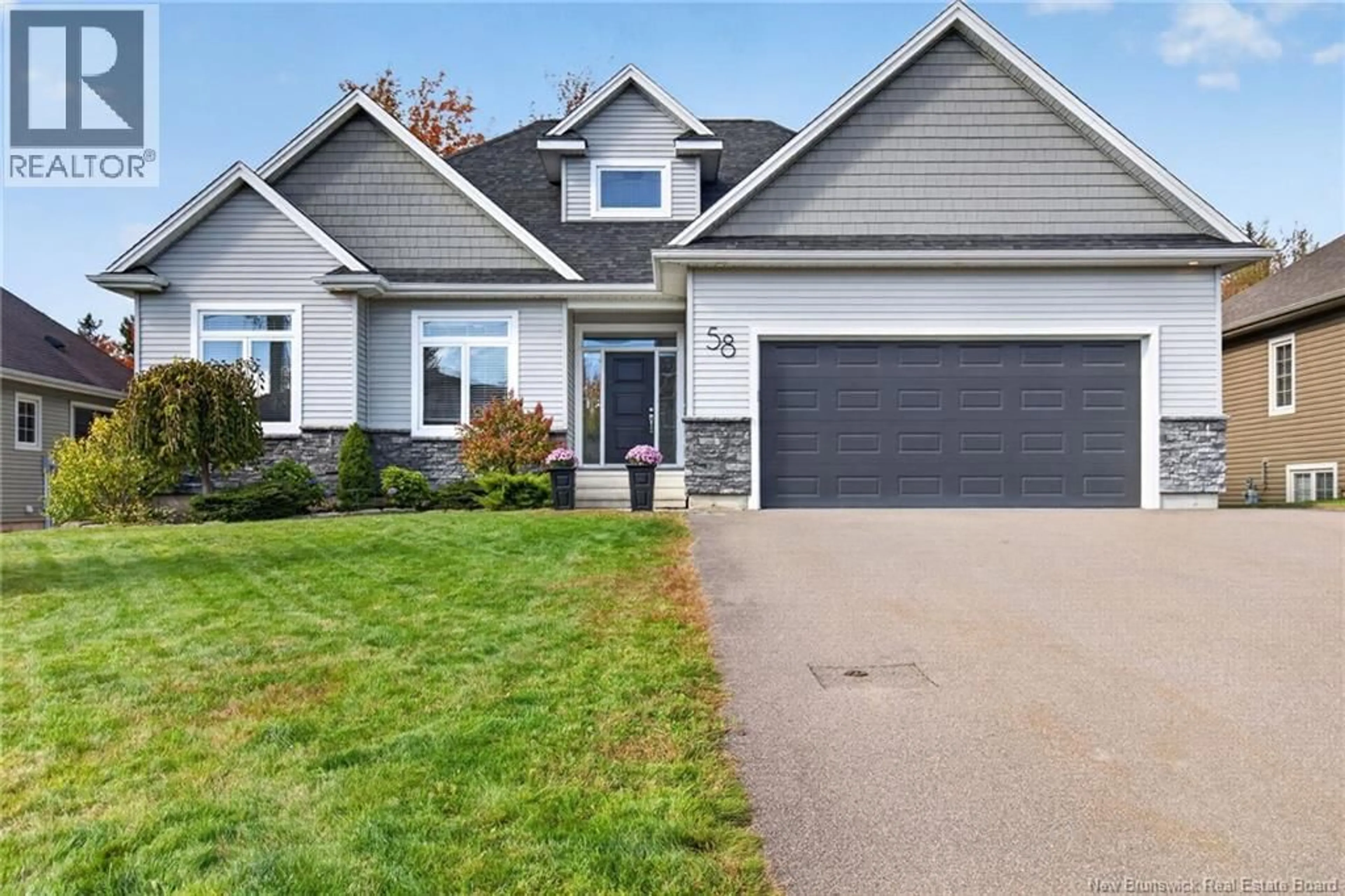 Home with vinyl exterior material, street for 58 VALMONT CRESCENT, Dieppe New Brunswick E1A1A2