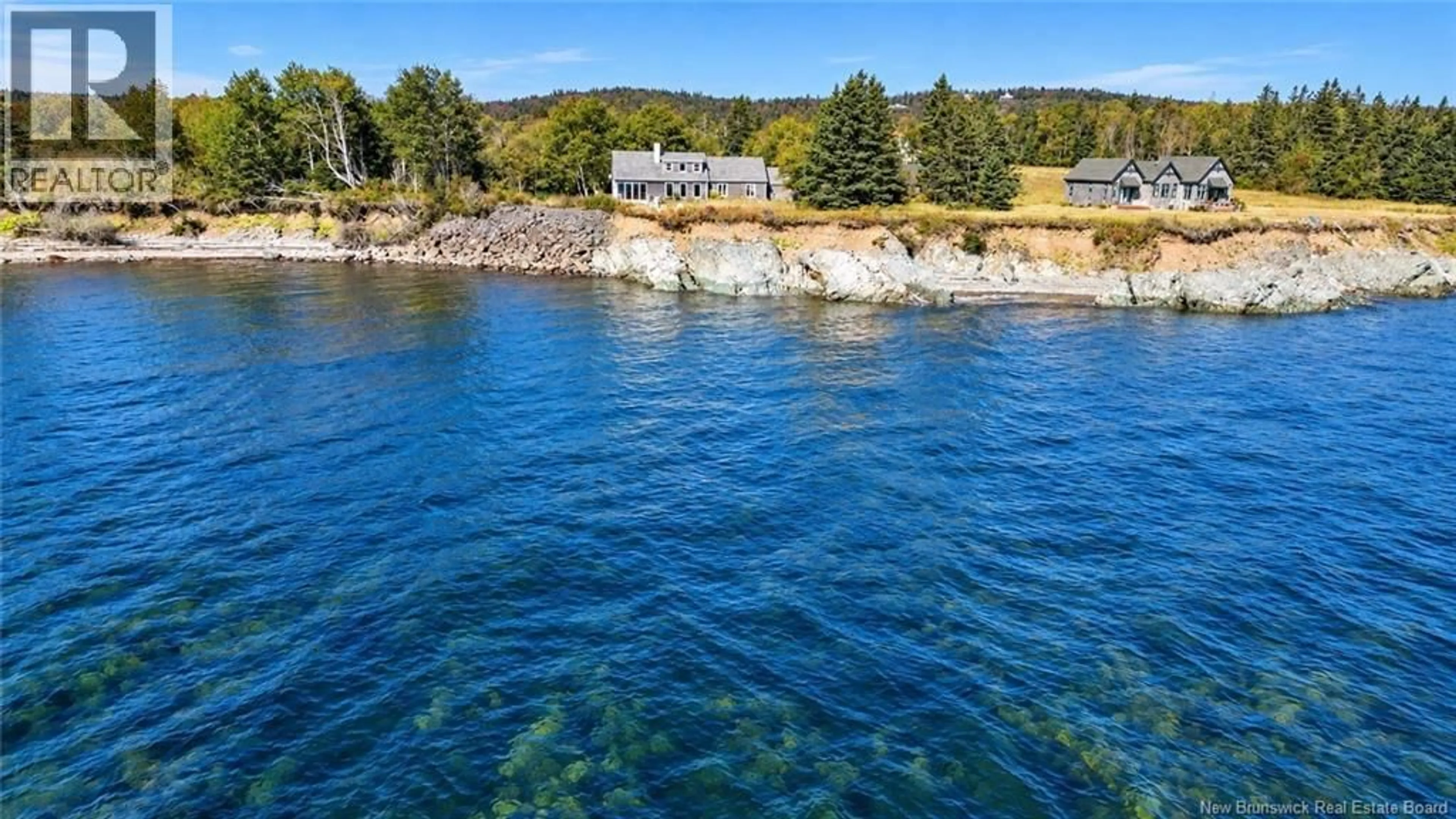 A pic from outside/outdoor area/front of a property/back of a property/a pic from drone, water/lake/river/ocean view for 537 ROUTE 776, Grand Manan New Brunswick E5G2C8