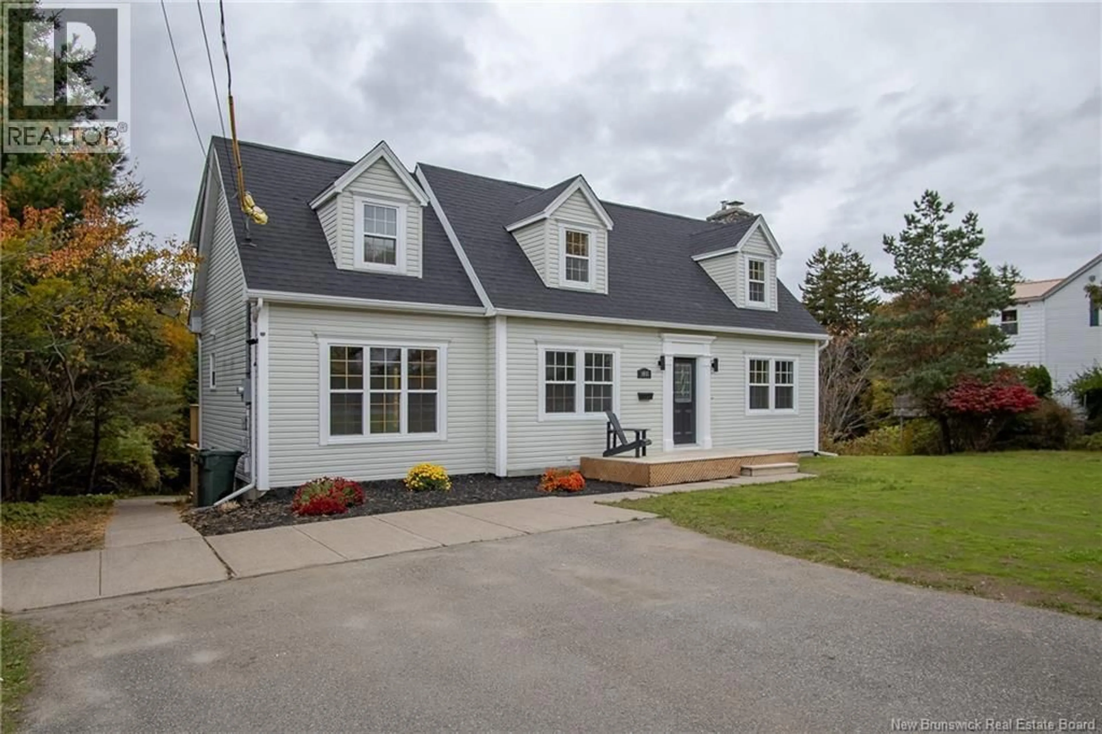 Home with vinyl exterior material, street for 1018 DEVER ROAD, Saint John New Brunswick E2M4J3