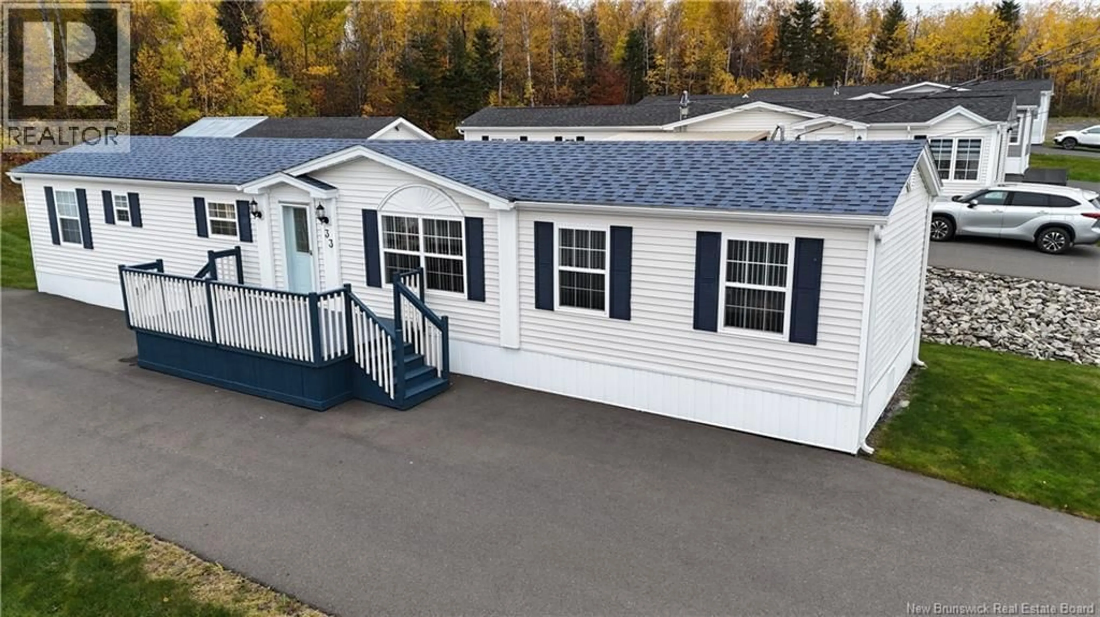 Home with vinyl exterior material, street for 33 KATE STREET, Grand-Sault/Grand Falls New Brunswick E3Z0A9