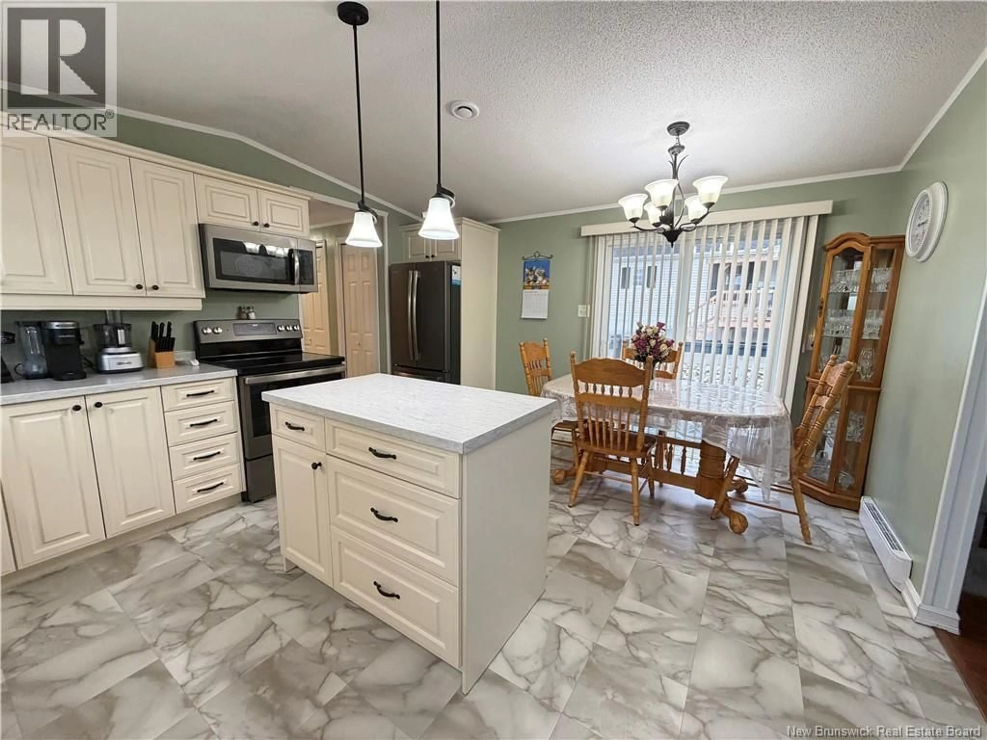 Open concept kitchen, ceramic/tile floor for 33 KATE STREET, Grand-Sault/Grand Falls New Brunswick E3Z0A9