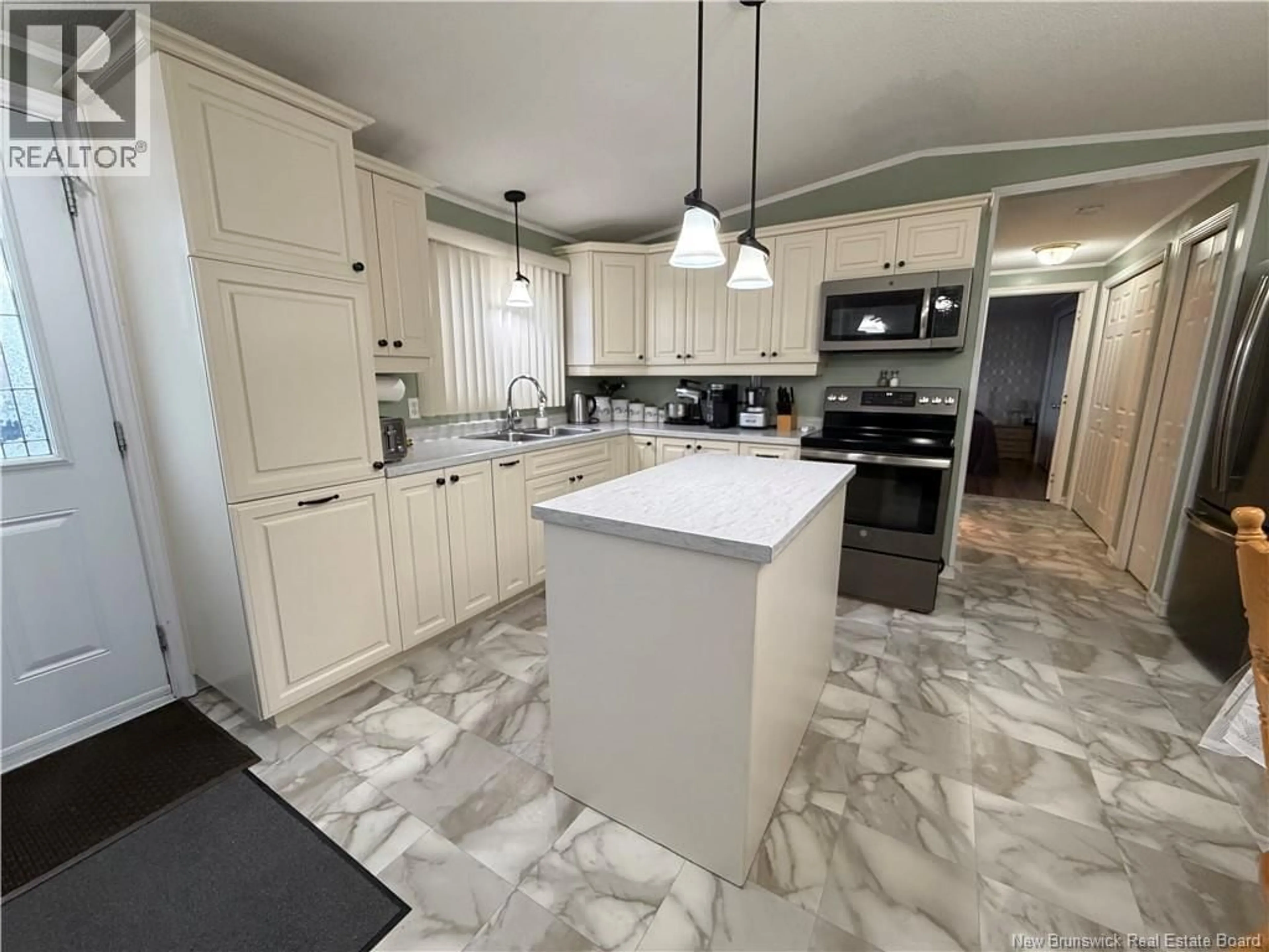Open concept kitchen, ceramic/tile floor for 33 KATE STREET, Grand-Sault/Grand Falls New Brunswick E3Z0A9