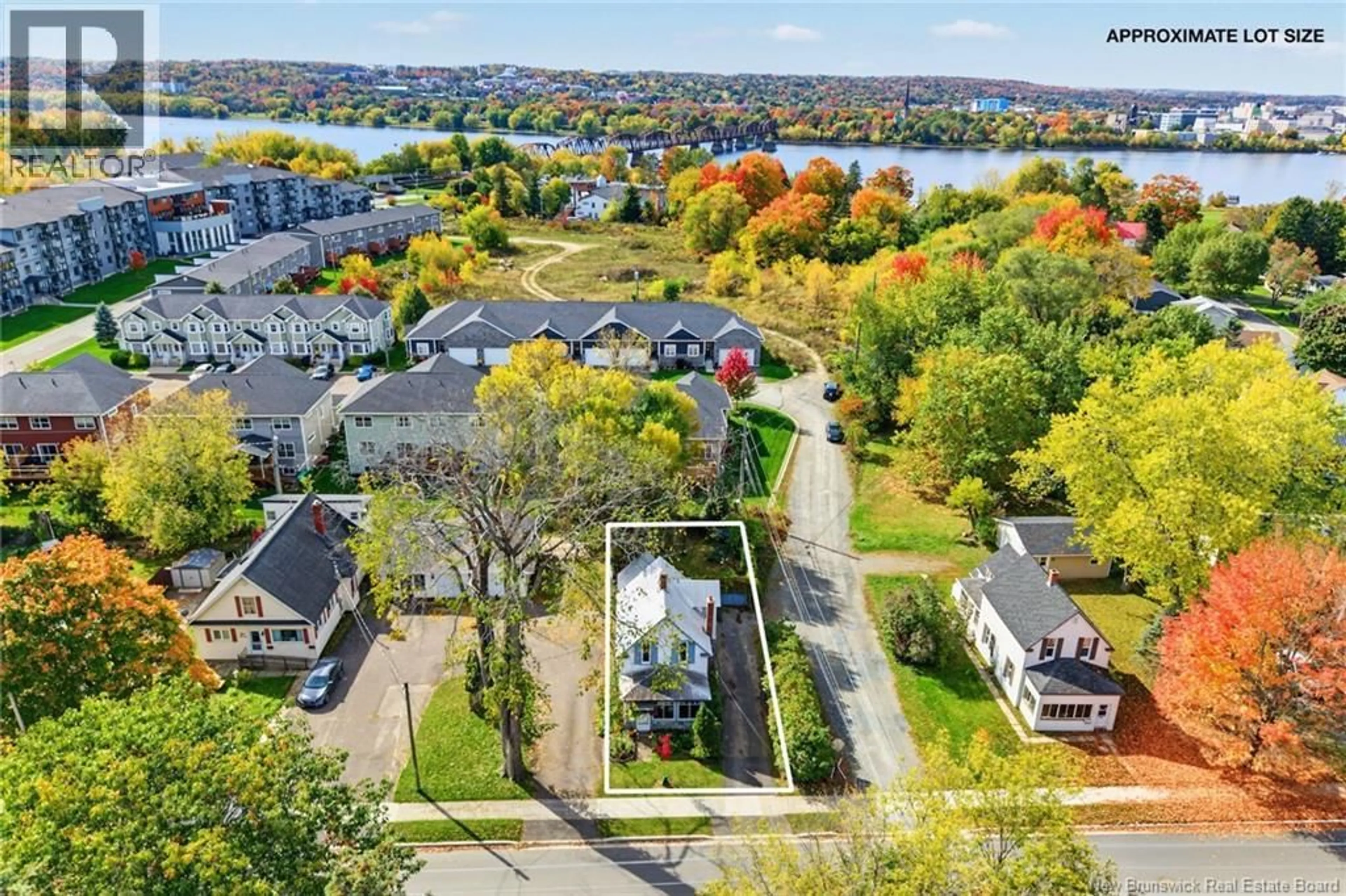 A pic from outside/outdoor area/front of a property/back of a property/a pic from drone, water/lake/river/ocean view for 880 BARKER STREET, Fredericton New Brunswick E3A3K6
