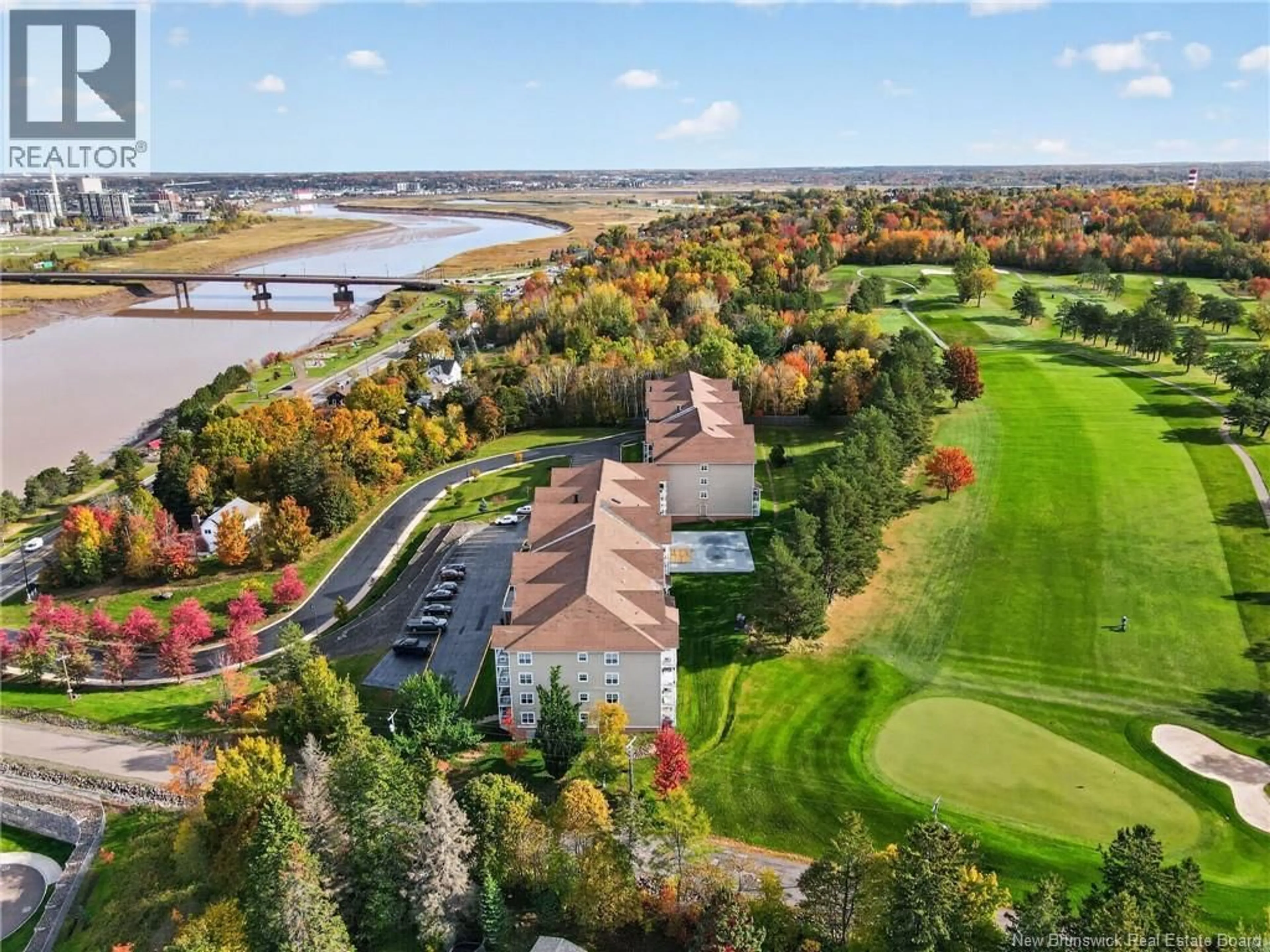 A pic from outside/outdoor area/front of a property/back of a property/a pic from drone, water/lake/river/ocean view for 306 - 208 COVERDALE ROAD, Riverview New Brunswick E1B0J2