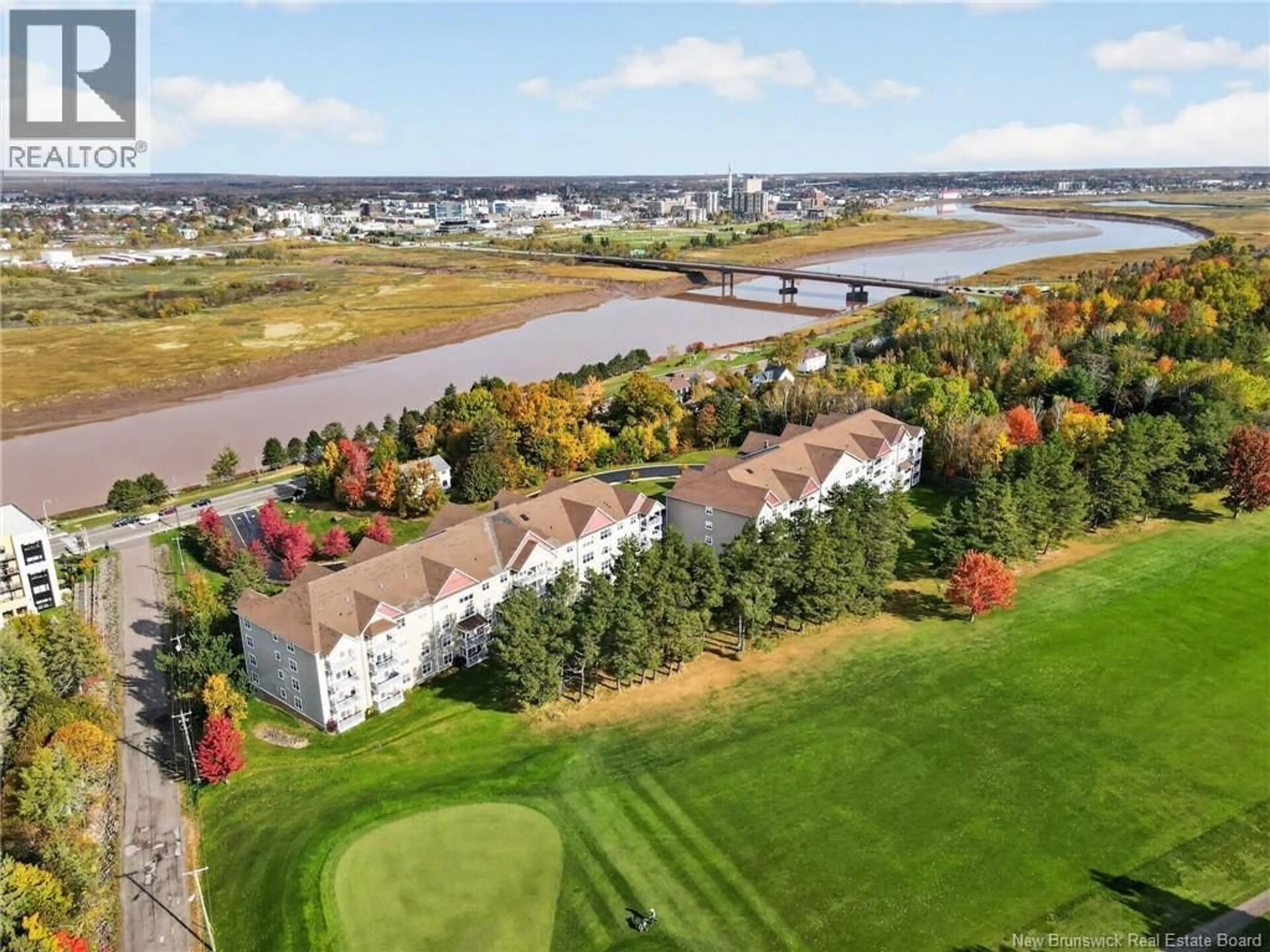A pic from outside/outdoor area/front of a property/back of a property/a pic from drone, water/lake/river/ocean view for 306 - 208 COVERDALE ROAD, Riverview New Brunswick E1B0J2