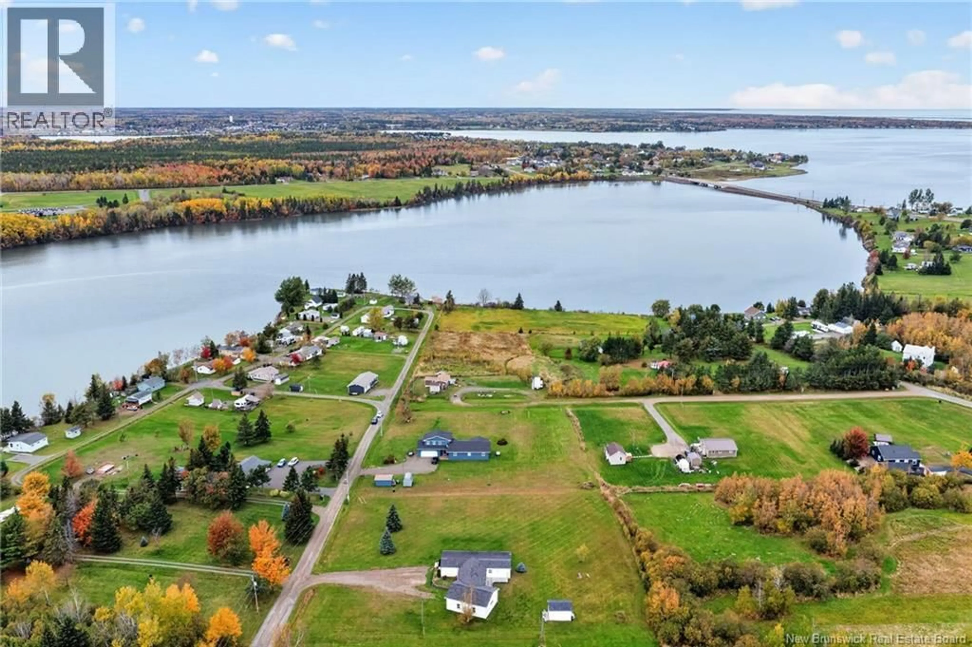 A pic from outside/outdoor area/front of a property/back of a property/a pic from drone, water/lake/river/ocean view for 72 POINTE DIONNE, Bouctouche New Brunswick E4S3Y6