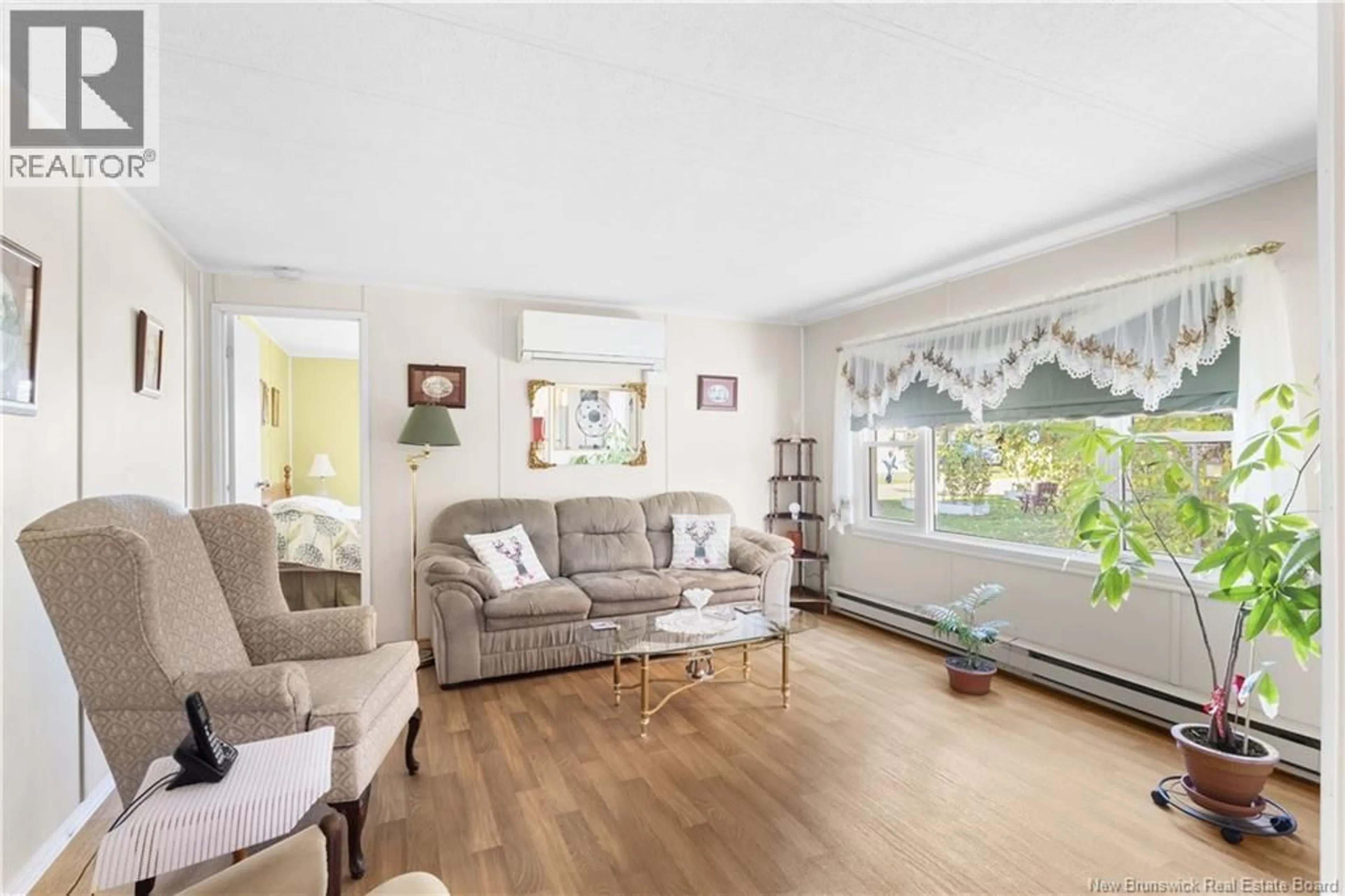Living room with furniture, unknown for 21 HILL STREET, Lincoln New Brunswick E3B6W2